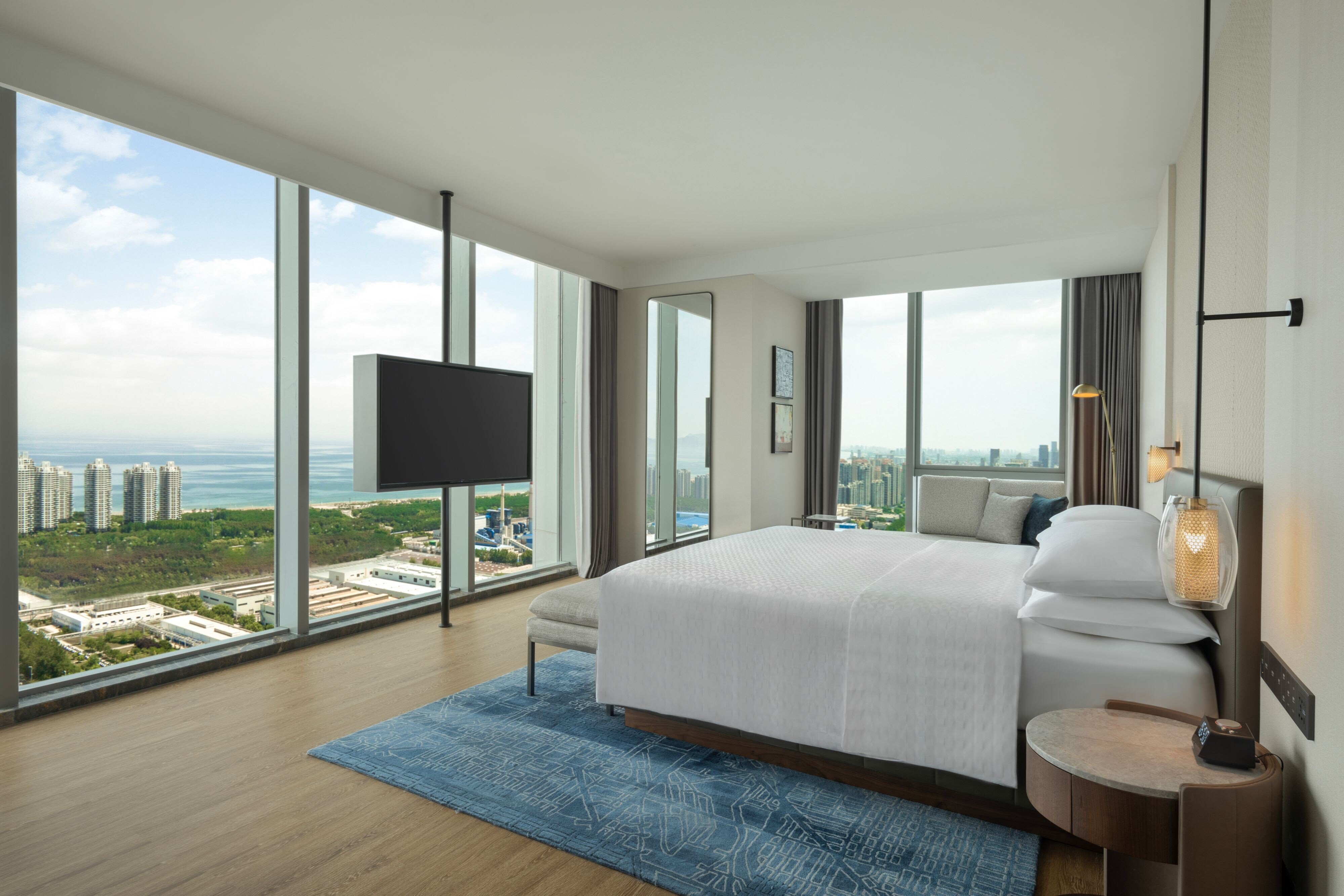 Four Points by Sheraton Yantai-guestroom-Suite Bedroom.jpg