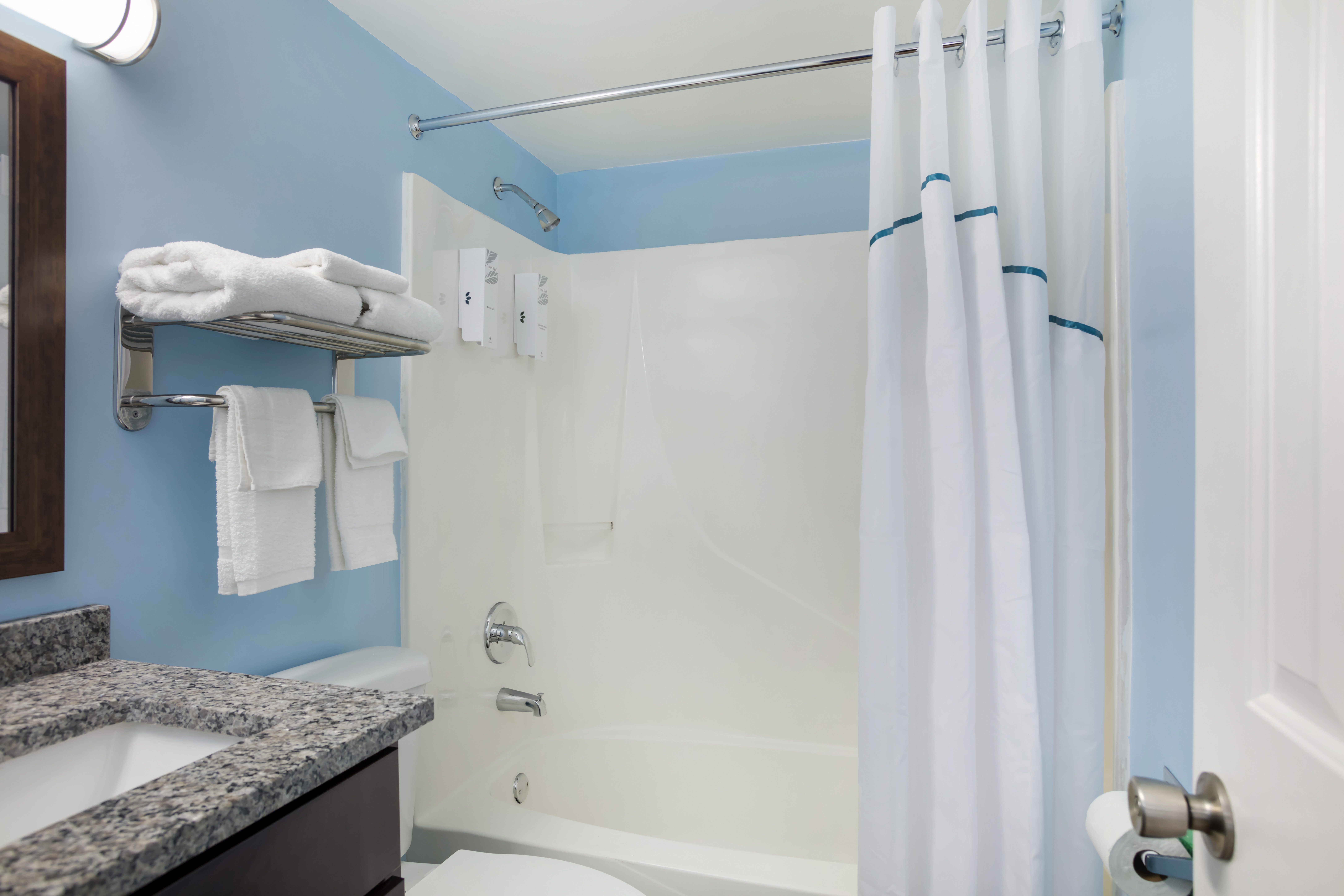 HOMETOWNE STUDIOS MADISON-guestroom-HTS Bathroom PRO Approved.jpg