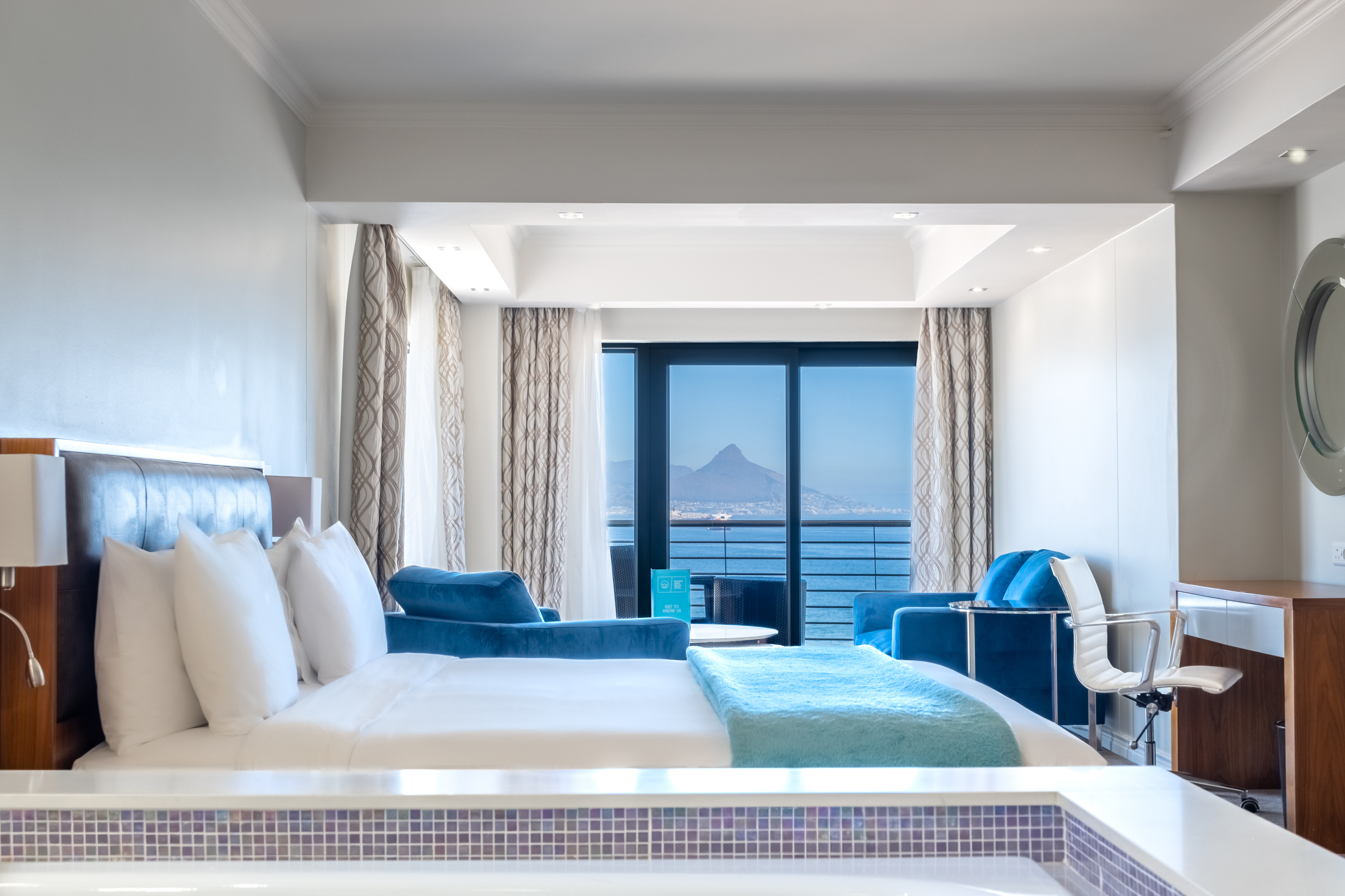 BLAAUWBERG BEACH HOTEL-guestroom-Sea Facing Table Mountain Junior Suite.jpg