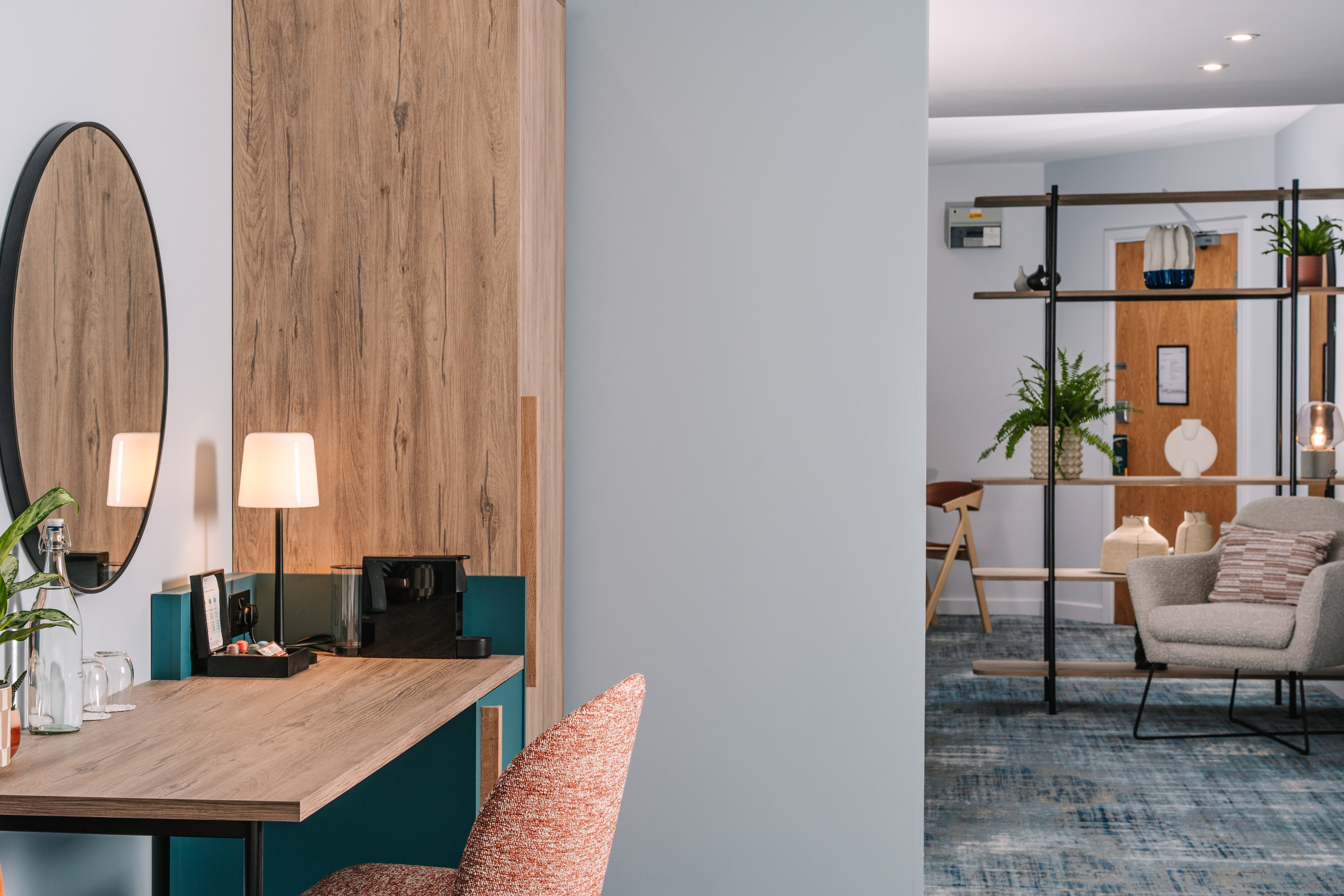 VOCO WINCHESTER HOTEL SPA BY IHG-guestroom-Desk Area in One Bedroom Suite.jpg