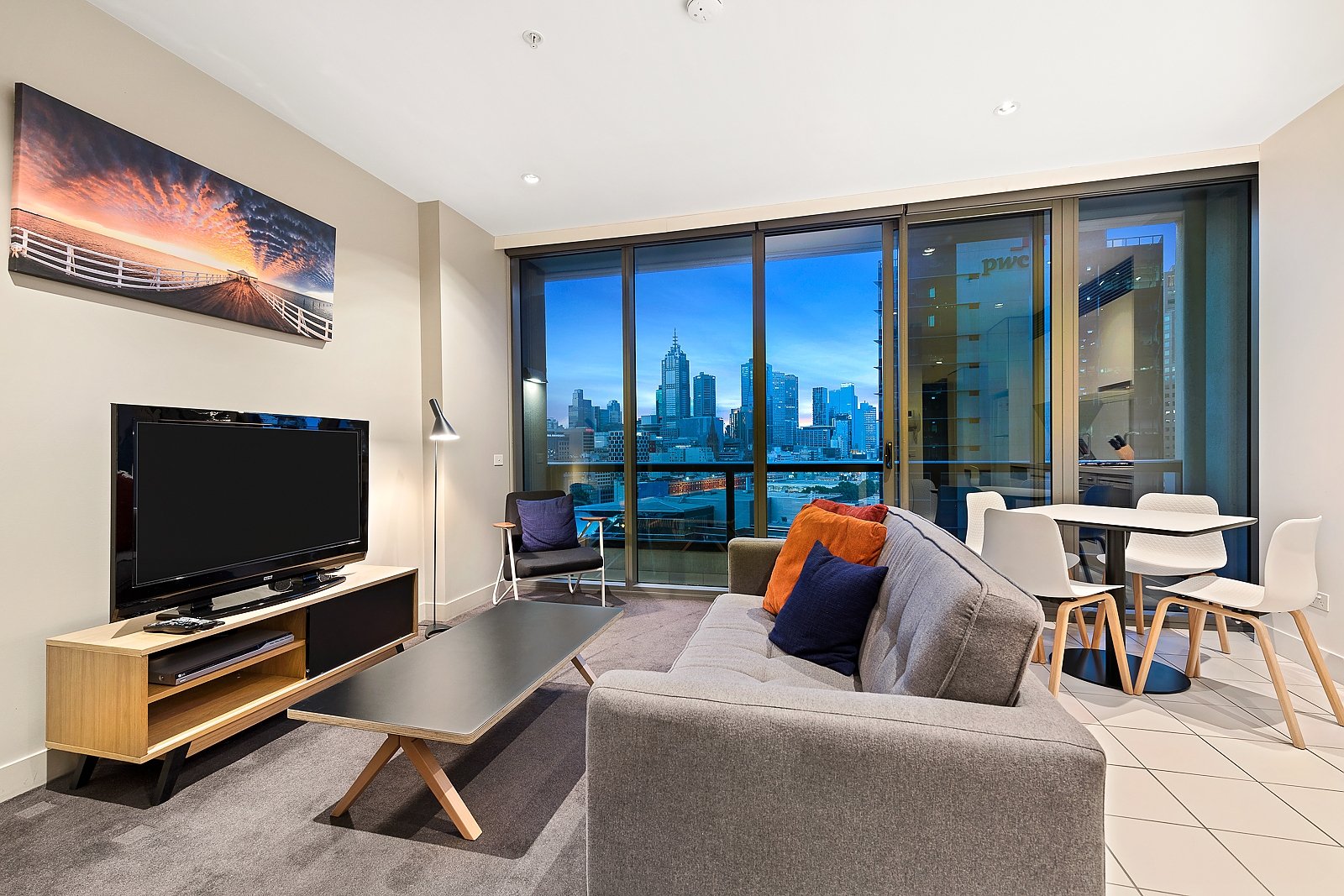 Convido - Freshwater Place-guestroom-One Bedroom With Balcony Living Area.jpg