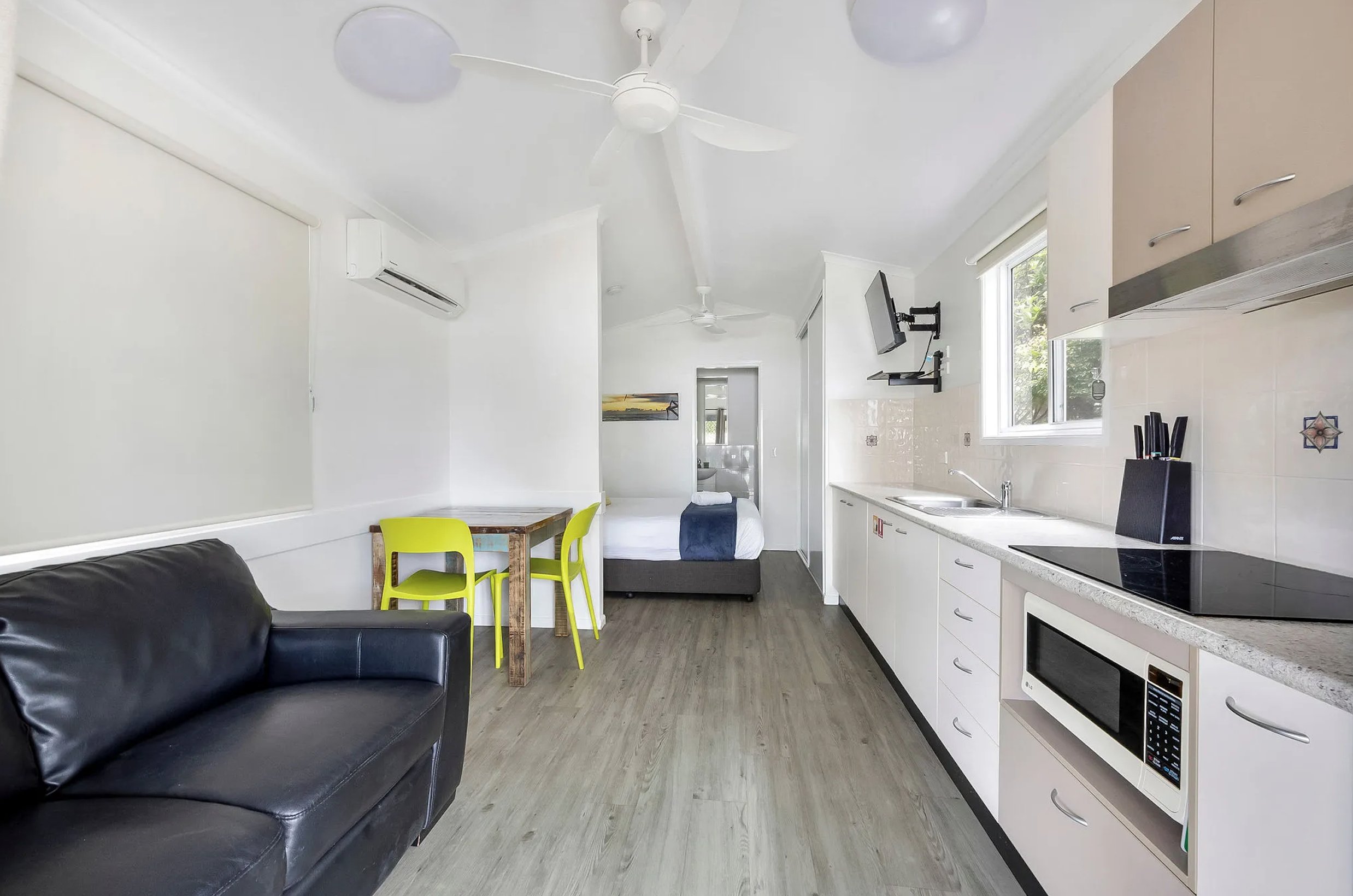 REFLECTIONS CORINDI BEACH - HO-guestroom-Standard Cabin Kitchen.jpg