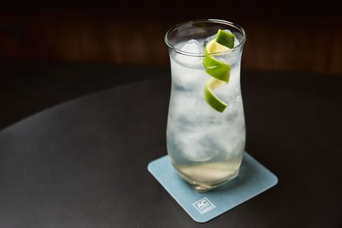 Cocktail with lime garnish