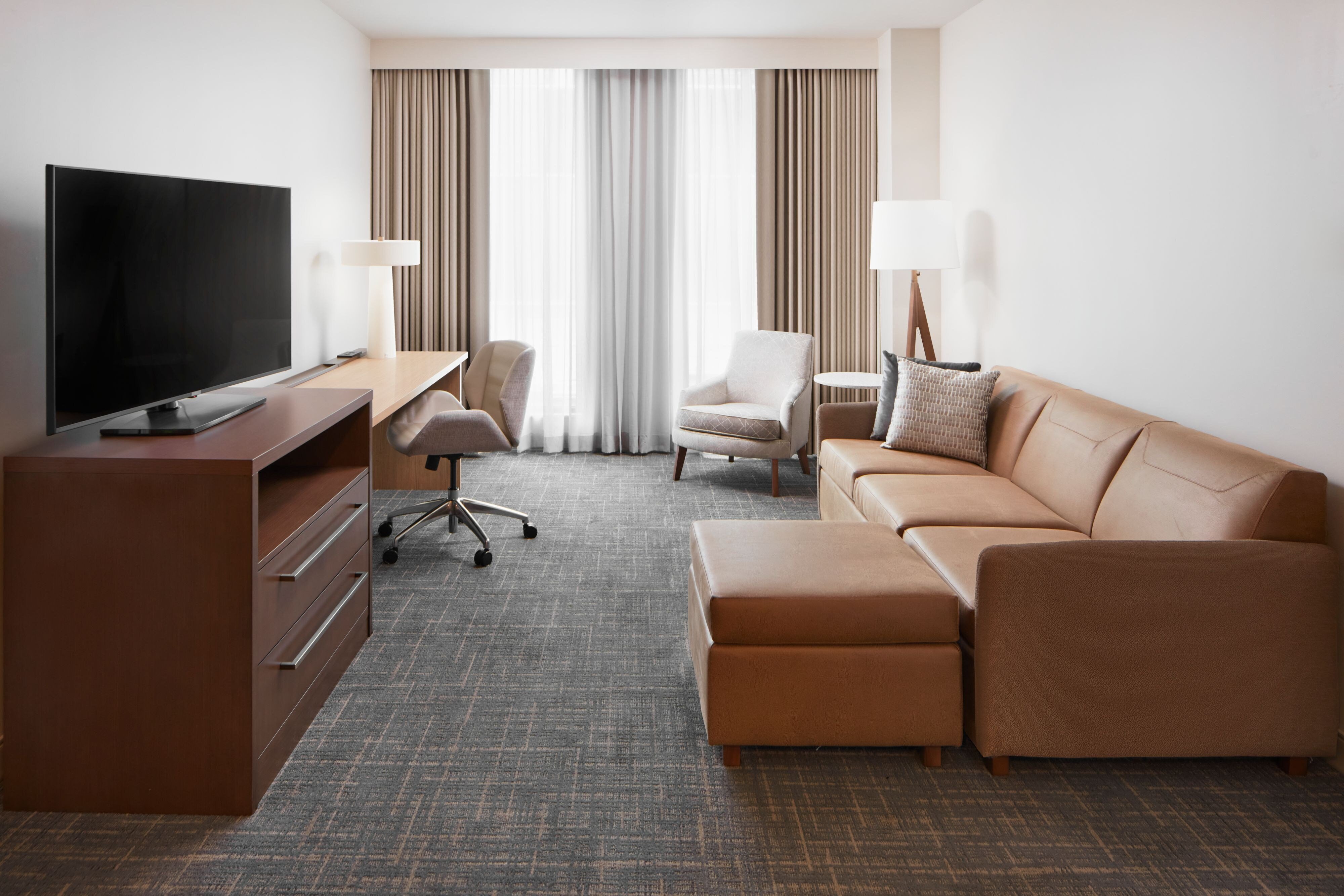 Residence Inn by Marriott Reston-guestroom-Living Room.jpg