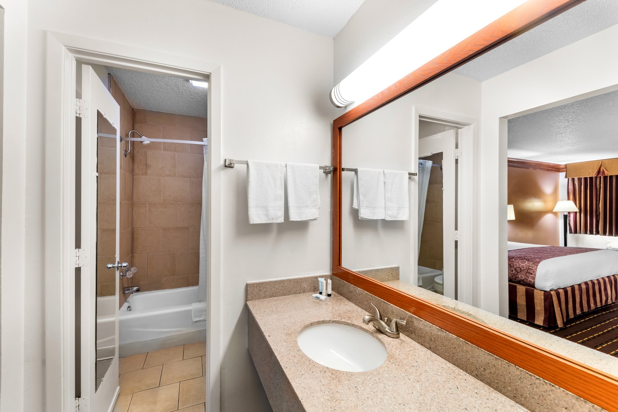 SCOTTISH INNS DECATUR TX-guestroom-STXDE King Bathroom.jpg