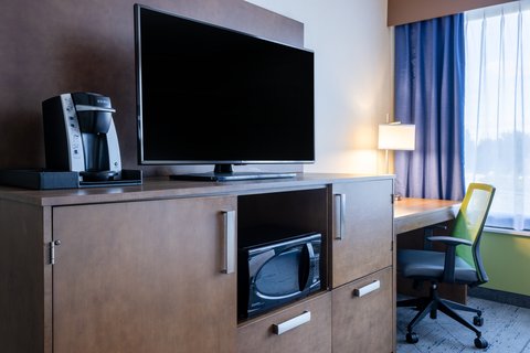 Pull back the covers, hop in and catch your favorite TV show.