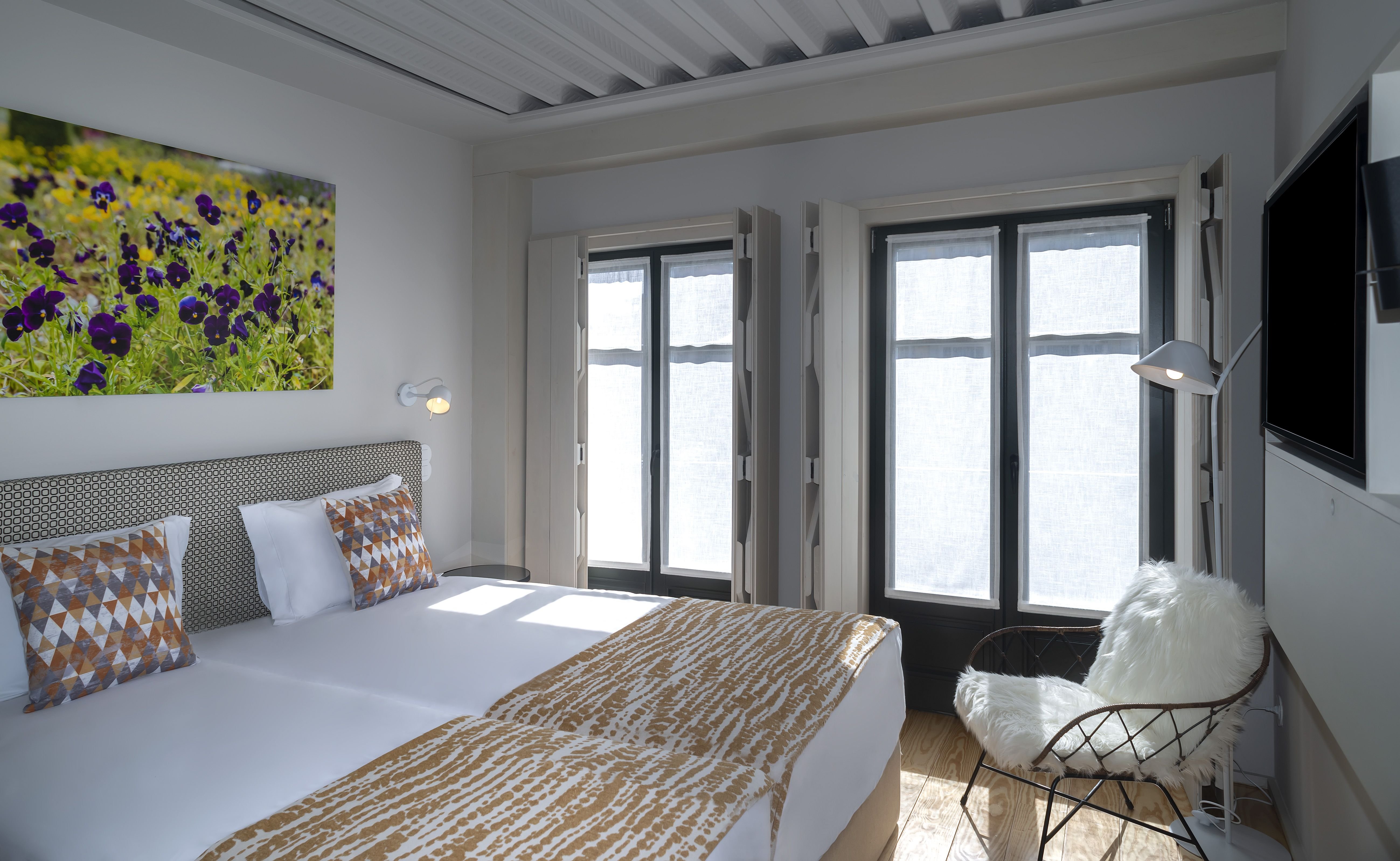 PORTA NOVA COLLECTION HOUSE-guestroom-Twin Balcony.jpg