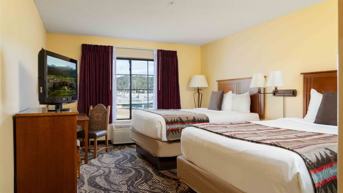 MCM ELEGANTE LODGE AND SUITES-guestroom-Double Queen Room.jpg