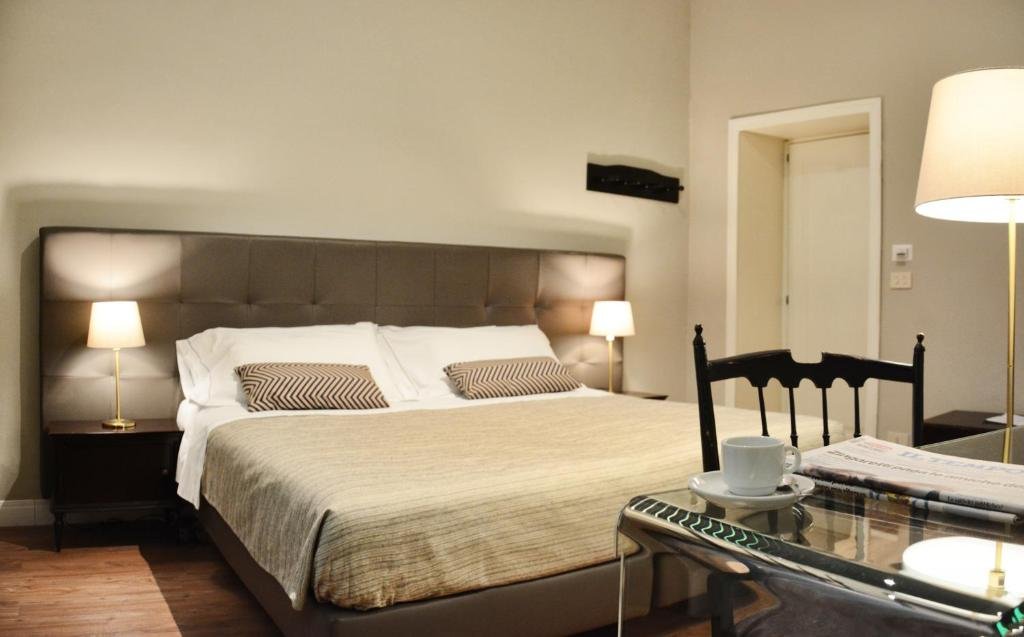 HOTEL TOURING WELLNESS AND BEAUTY-guestroom-Guest Room.jpg