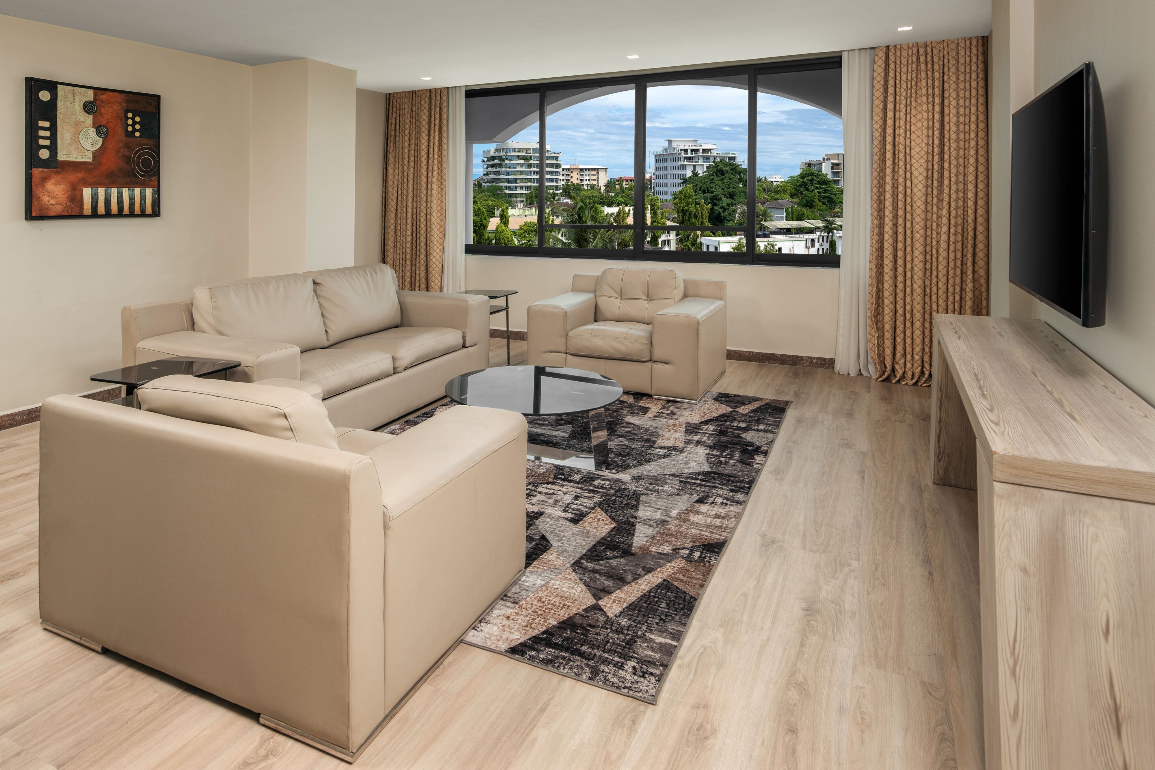 Delta Hotels by Marriott Dar es Salaam-guestroom-Junior Suite Lounge.jpg