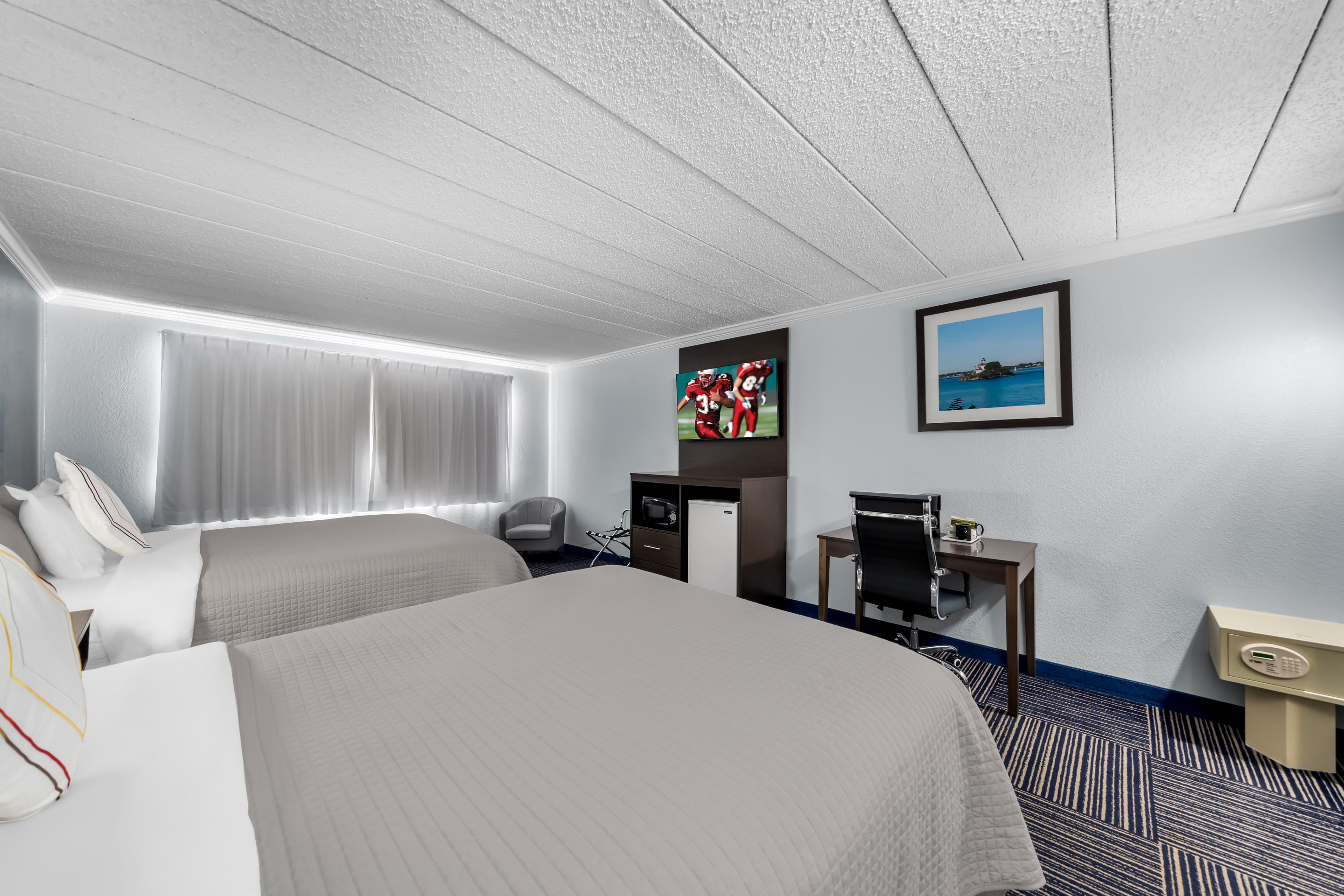 ADMIRALTY INN AND SUITES-guestroom-TRC NS Deluxe Queen Micro PRO Approved NDQM.jpg