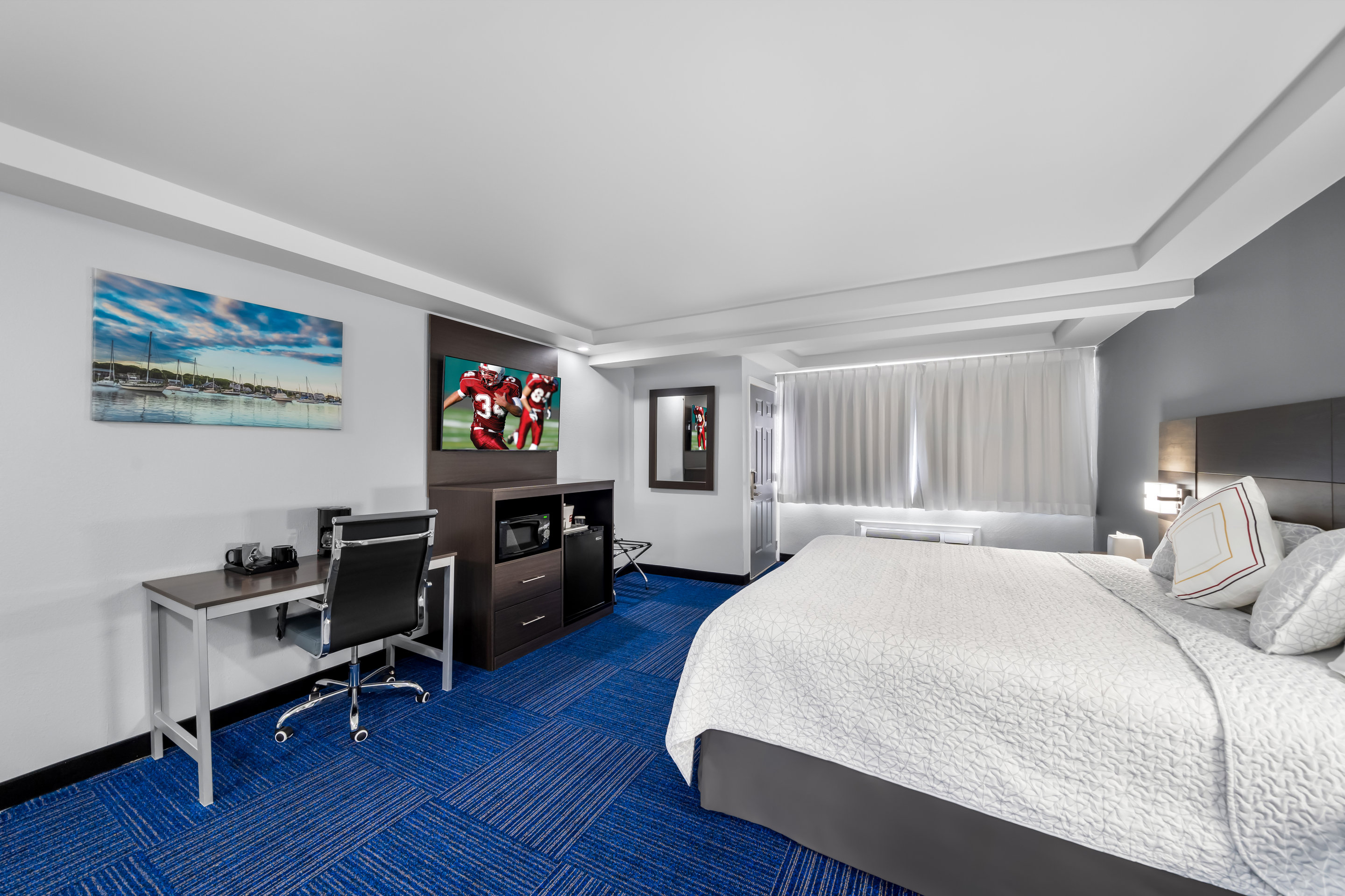 ADMIRALTY INN AND SUITES-guestroom-TRC NS ADA Superior King Micro Roll In Shower PRO Approved NAPKR.jpg