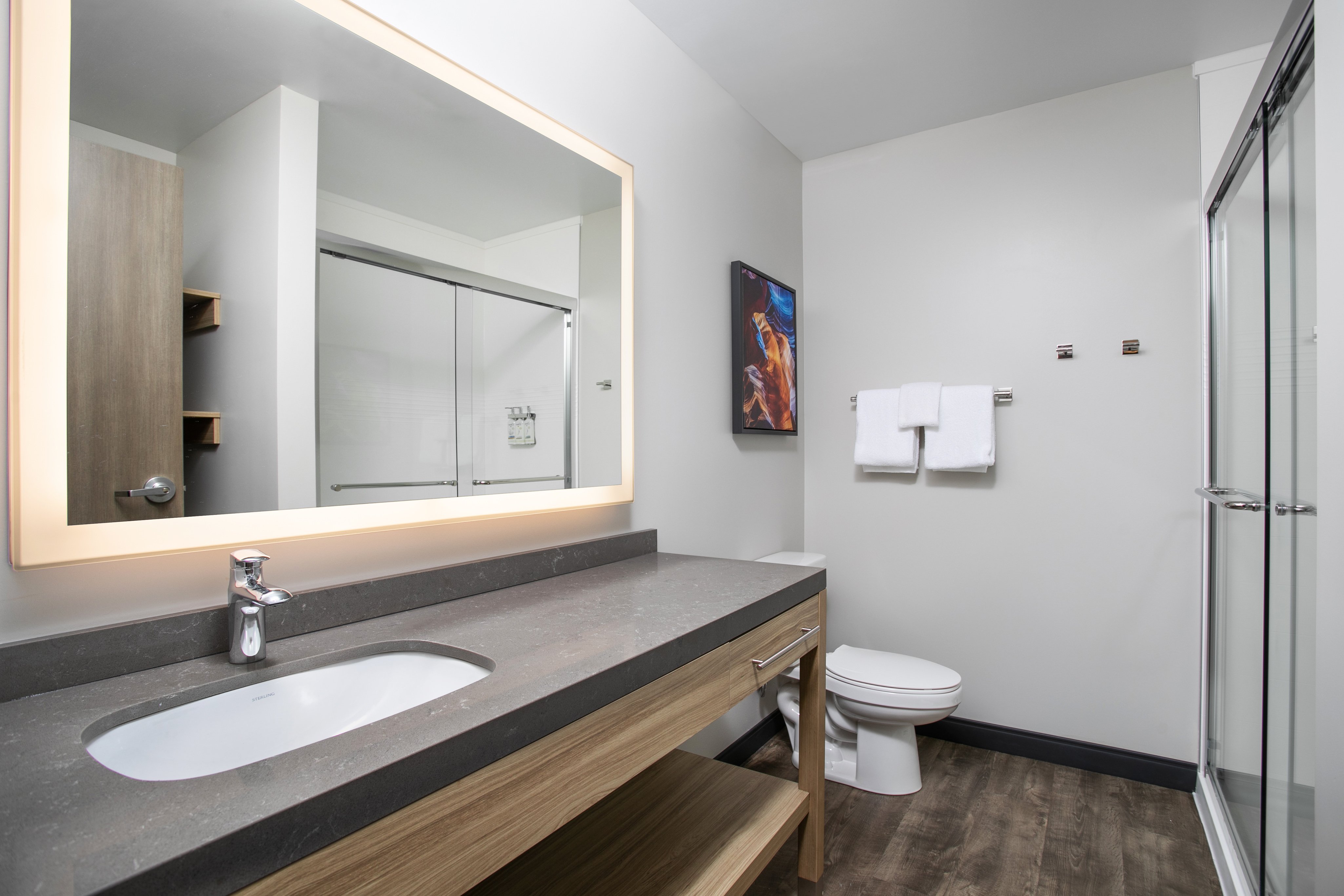 CANDLEWOOD STES EAST BY IHG-guestroom-Start your day in a well-lit bathroom with ample counter space..jpg