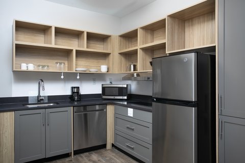 Accessible ADA kitchen with all the essentials for easy meal prep.