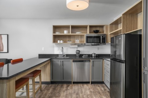 Prepare meals in your kitchen with cookware and dinnerware.