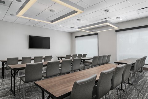Modern meeting space with great light and AV-ready setup.