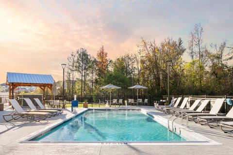 Enjoy sunny days at our outdoor pool, perfect for relaxation.