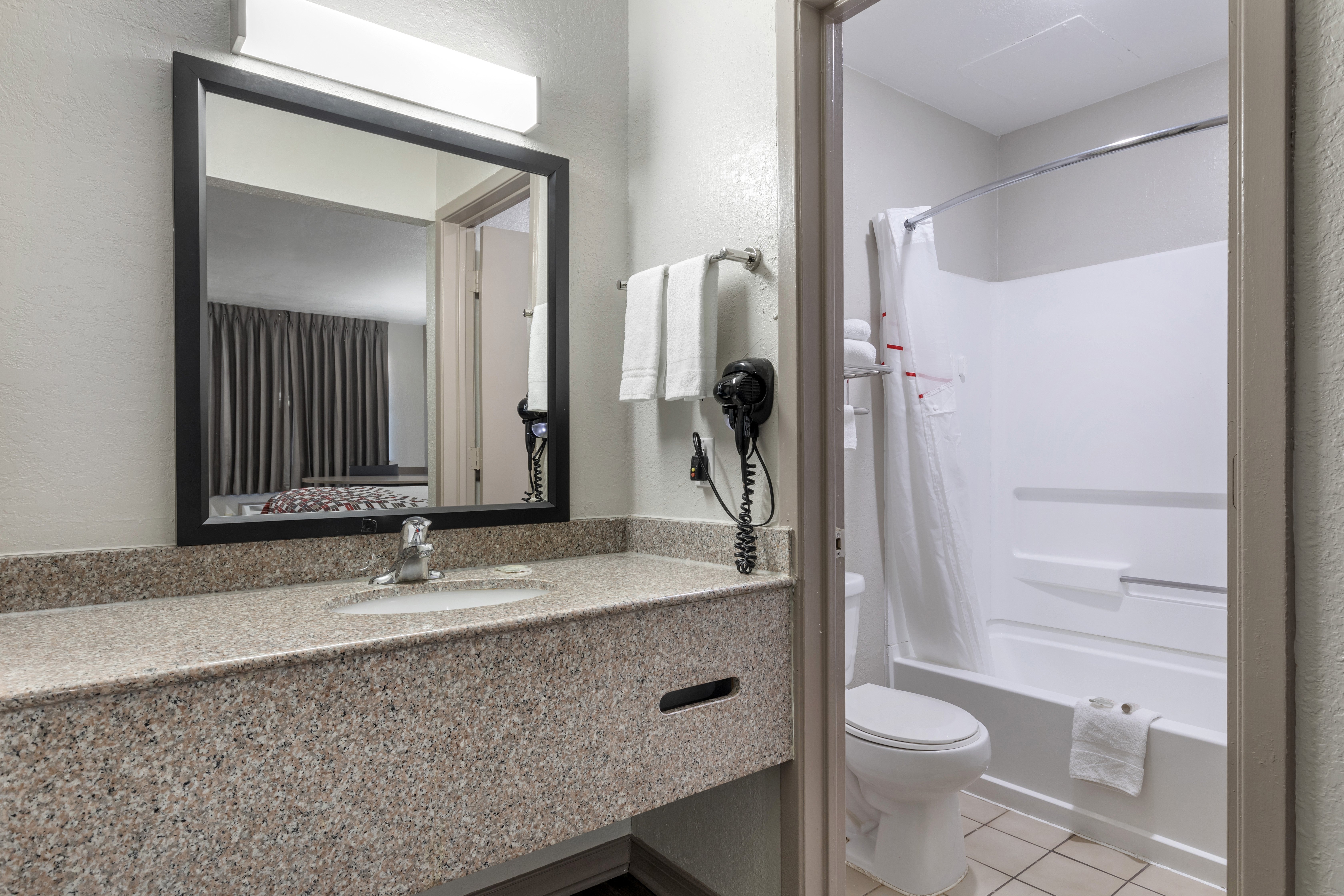 RED ROOF CANTON, TX-guestroom-RRI Bathroom PRO Approved.jpg