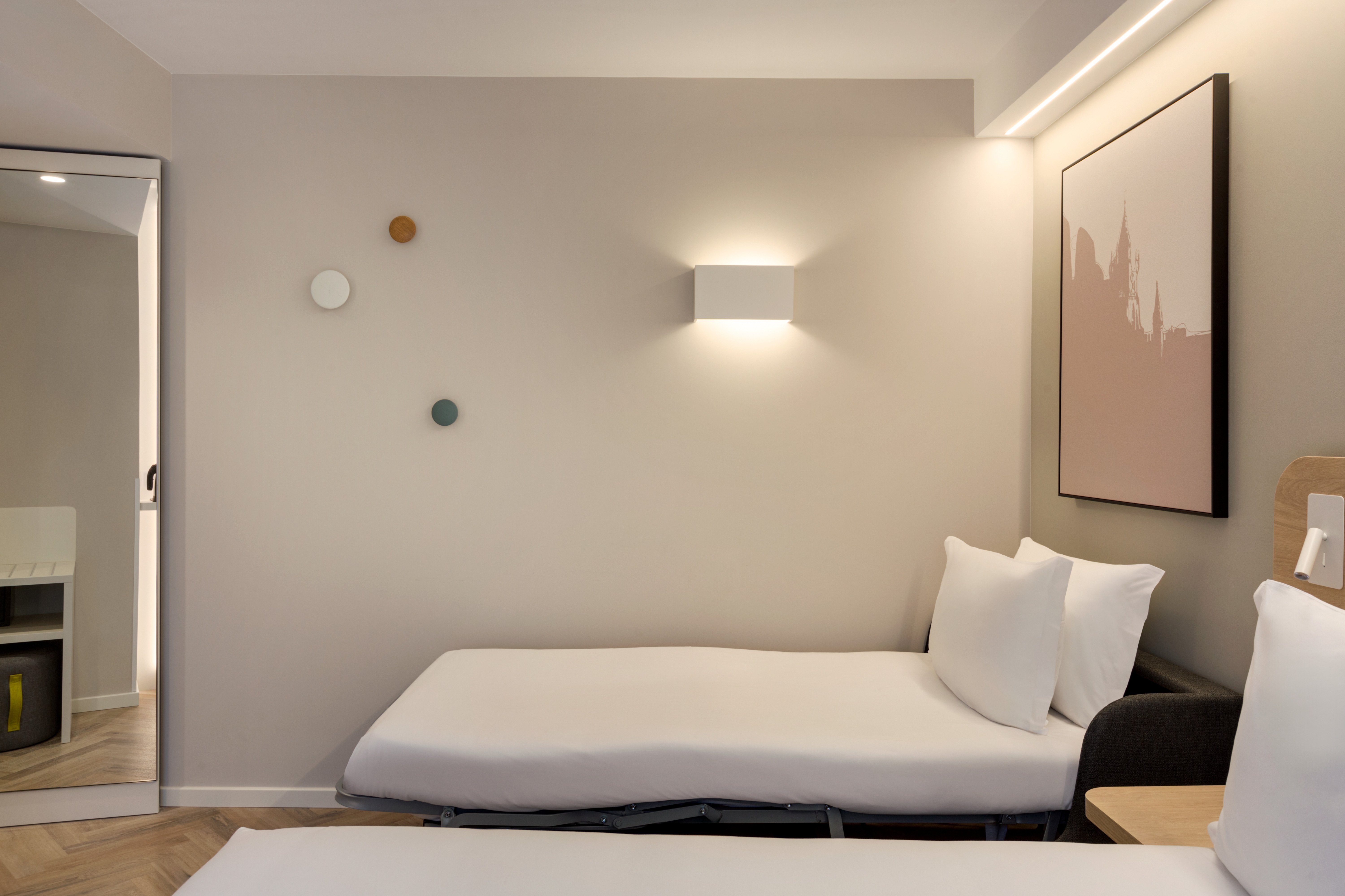 HOLIDAY INN EXP EVORA BY IHG-guestroom-Sofa Bed.jpg