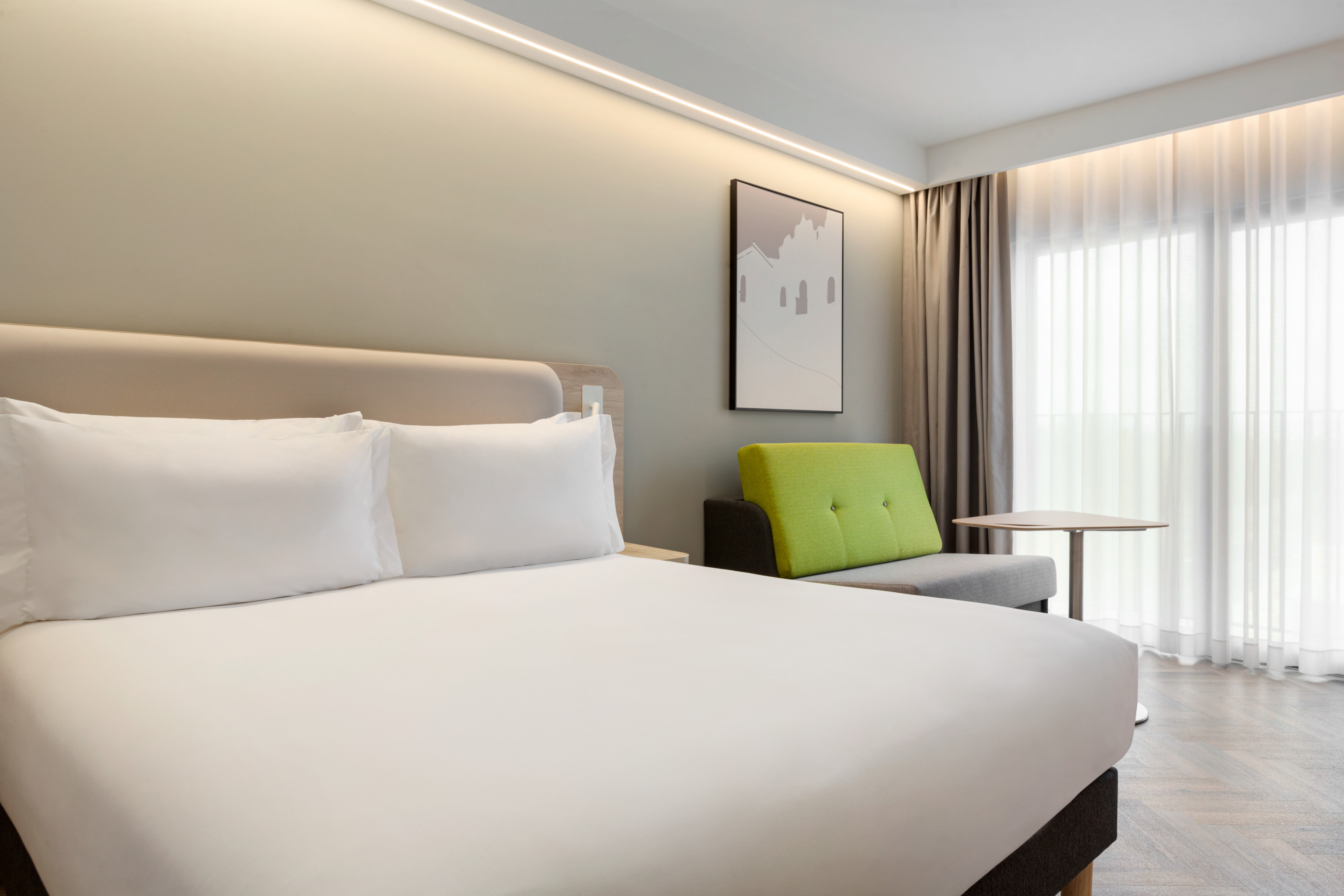 HOLIDAY INN EXP EVORA BY IHG-guestroom-Upgrade to a room with a sofa-bed for ultimate relaxation..jpg