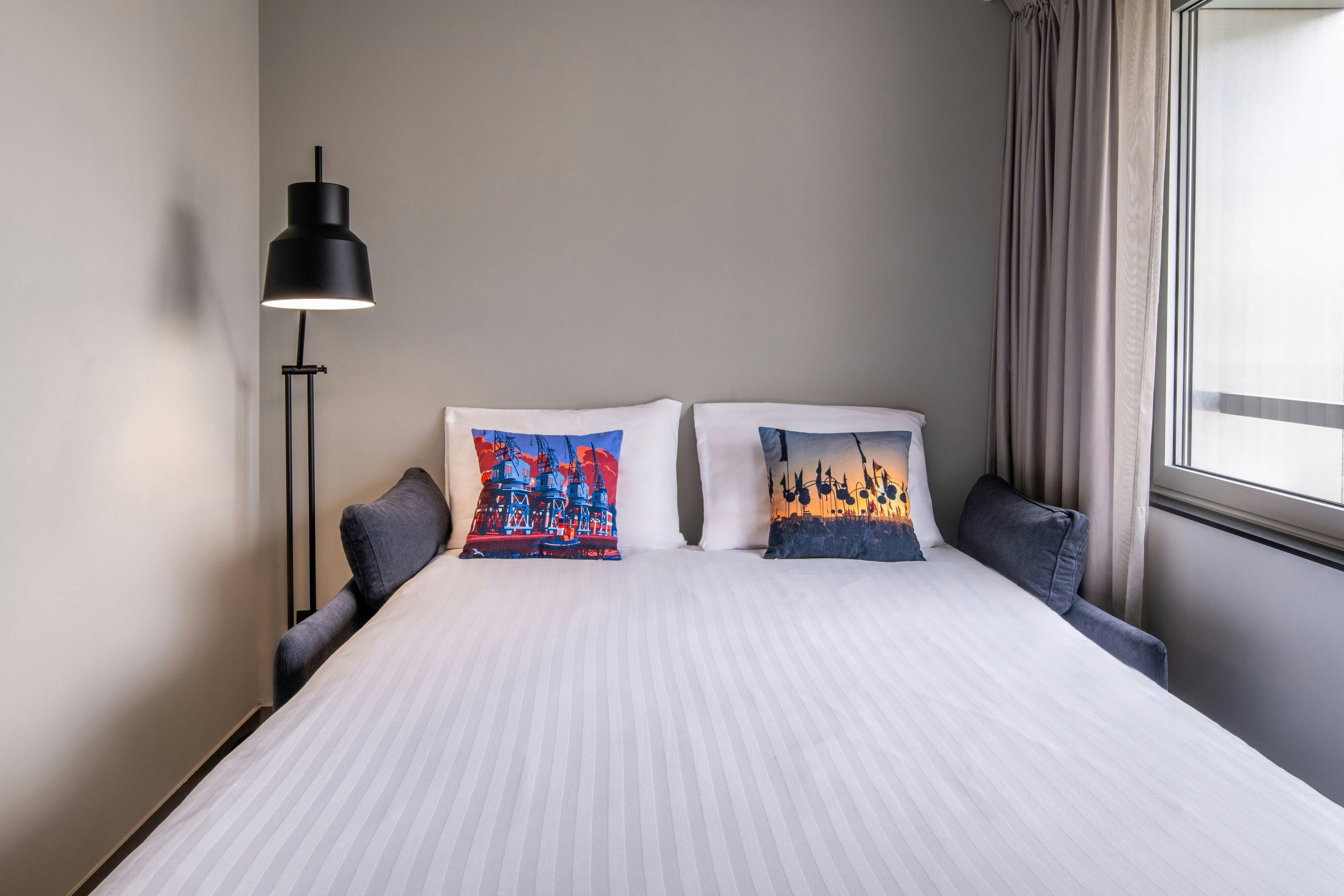 Moxy Hotel Bordeaux Wine Museum-guestroom-Sofa bed ideal for a stay in bordeaux with friends.jpg