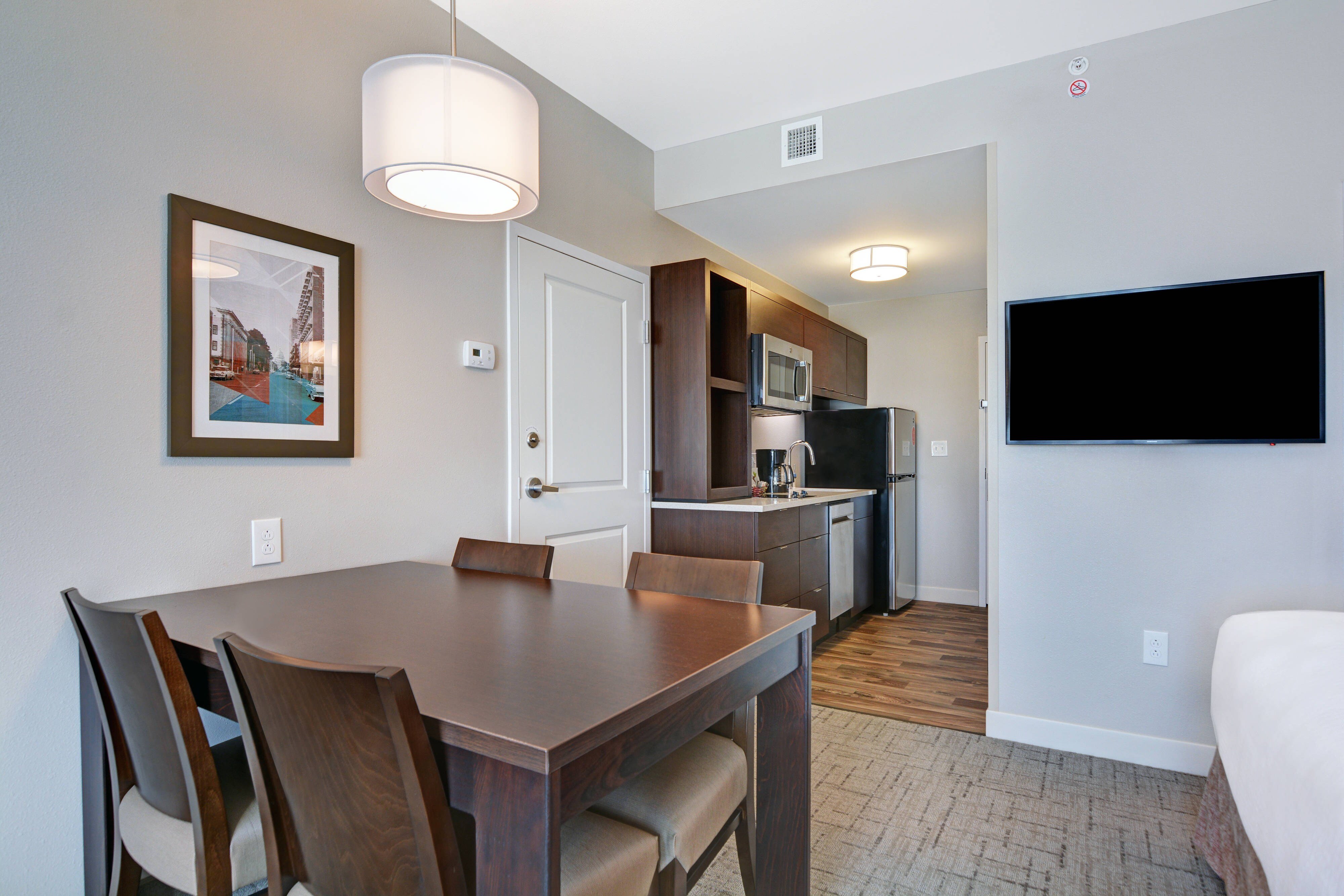 TownePlace Suites Jackson Airport Flowood-guestroom-Queen/Queen Studio Dining Area.jpg