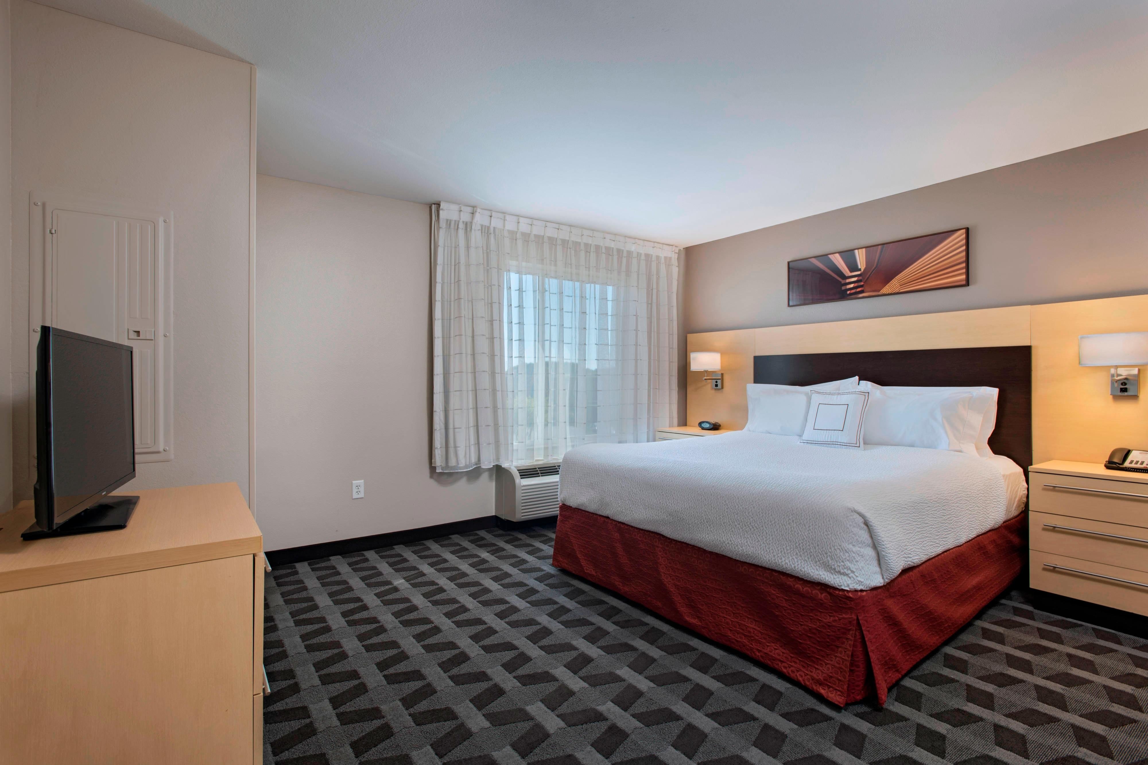 TownePlace Suites by Marriott Fayetteville Cross Creek-guestroom-One-Bedroom Suite - Bedroom.jpg