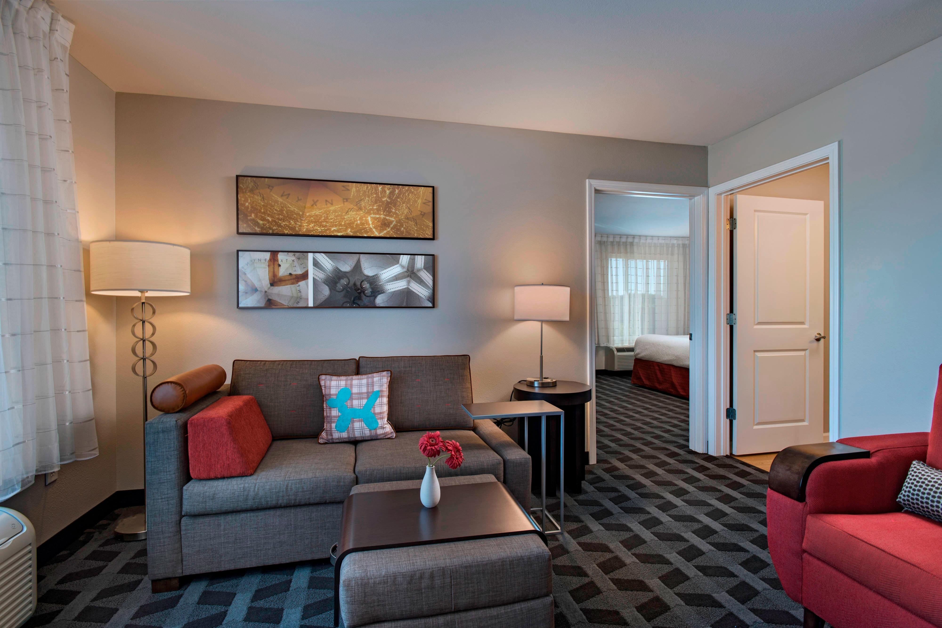 TownePlace Suites by Marriott Fayetteville Cross Creek-guestroom-One-Bedroom Suite - Living Room.jpg