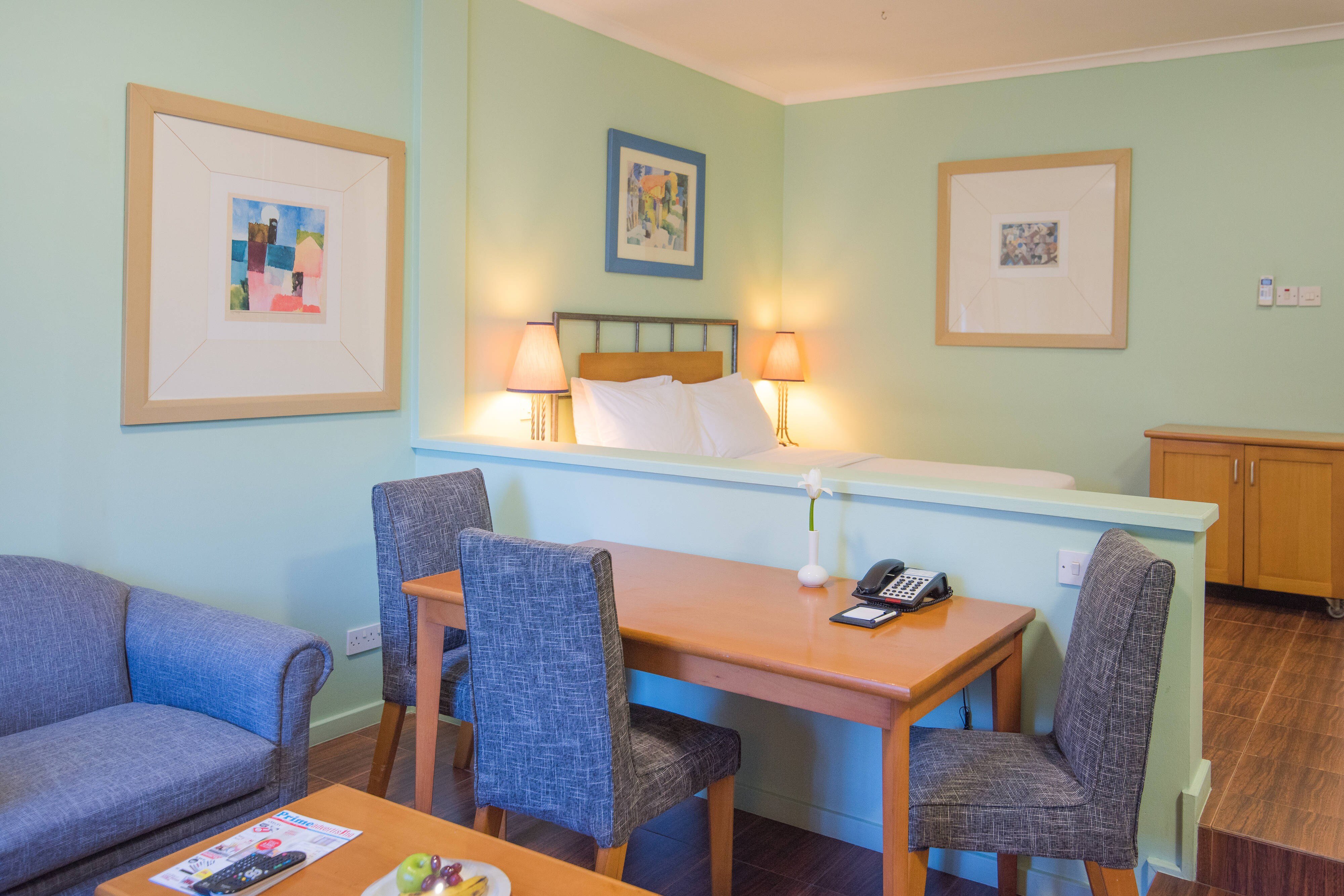 Protea Hotel by Marriott Dar es Salaam Oyster Bay-guestroom-Studio Queen Suite - Dining Area.jpg