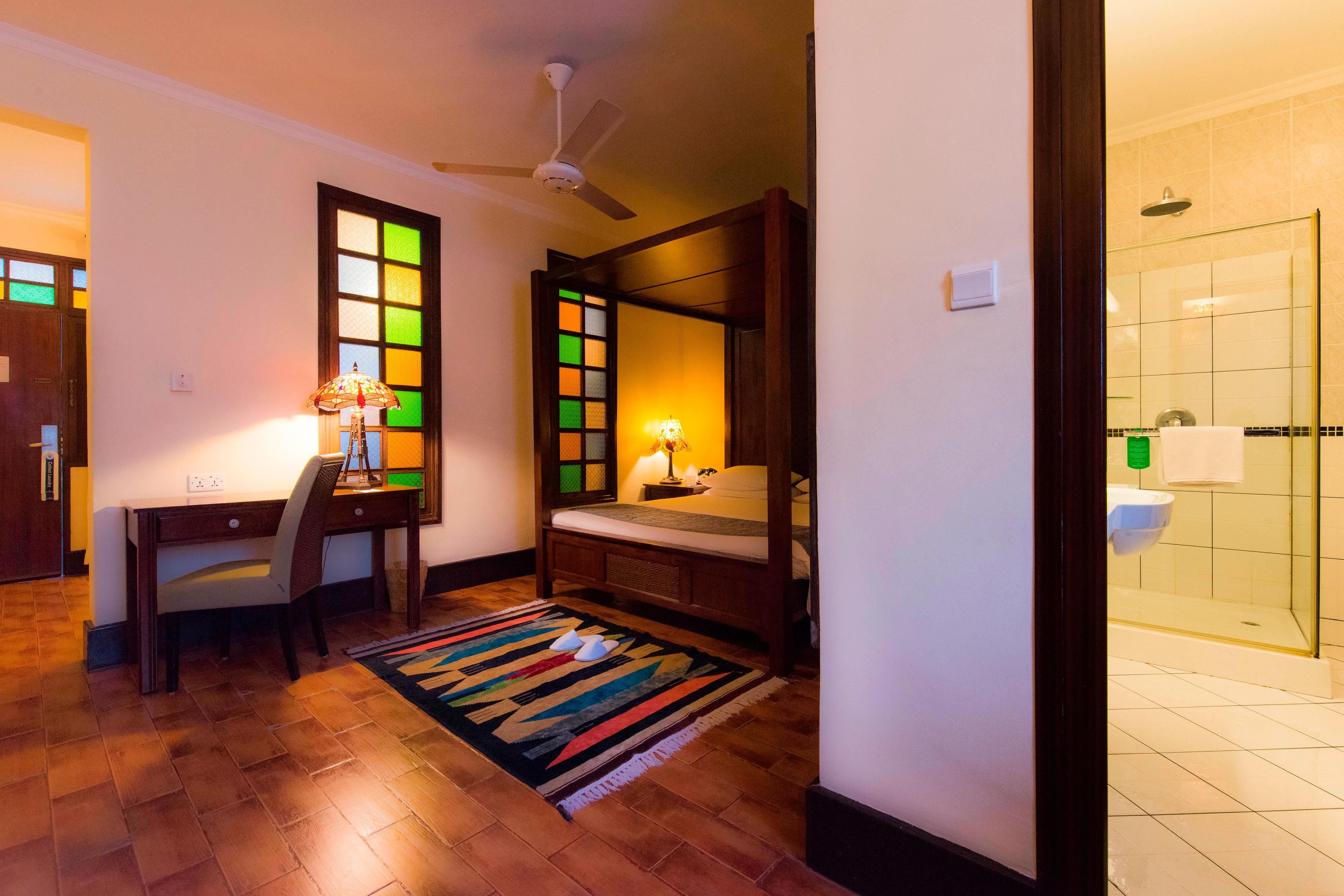 Protea Hotel by Marriott Dar es Salaam Courtyard-guestroom-Deluxe Room.jpg