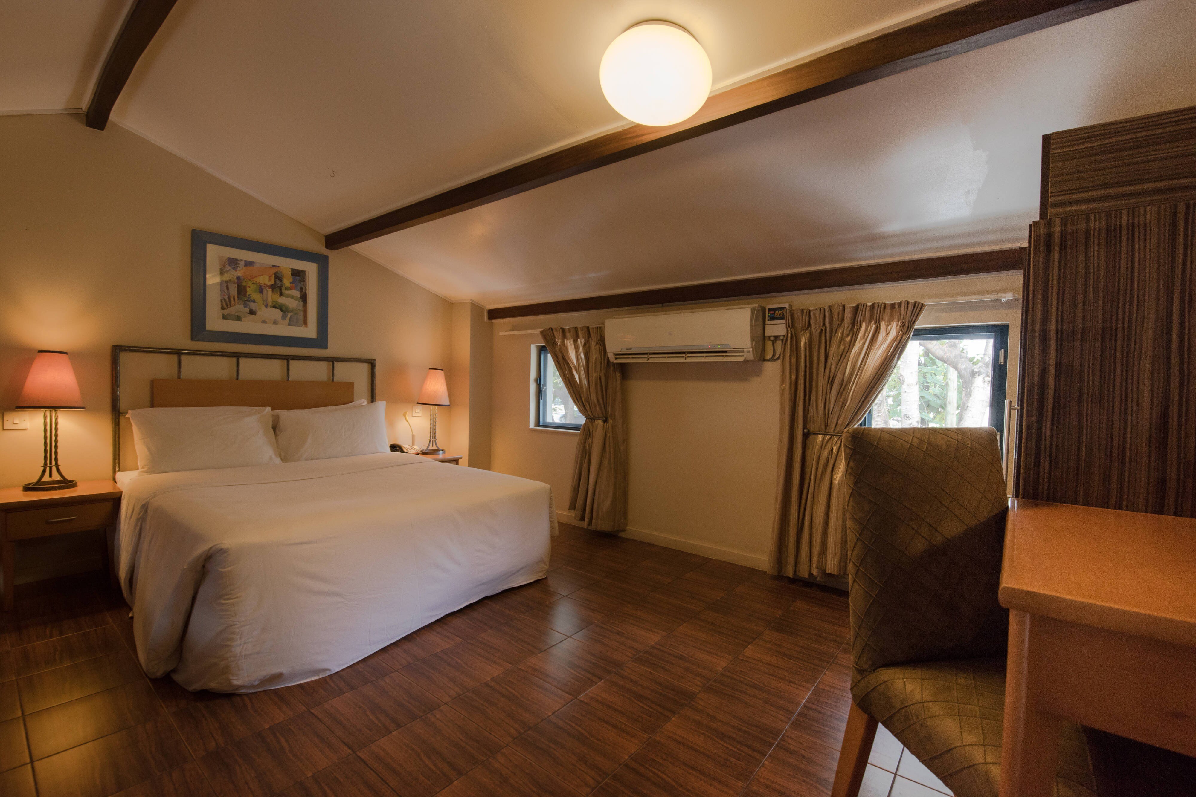 Protea Hotel by Marriott Dar es Salaam Oyster Bay-guestroom-Bi-Level Loft - Bedroom.jpg