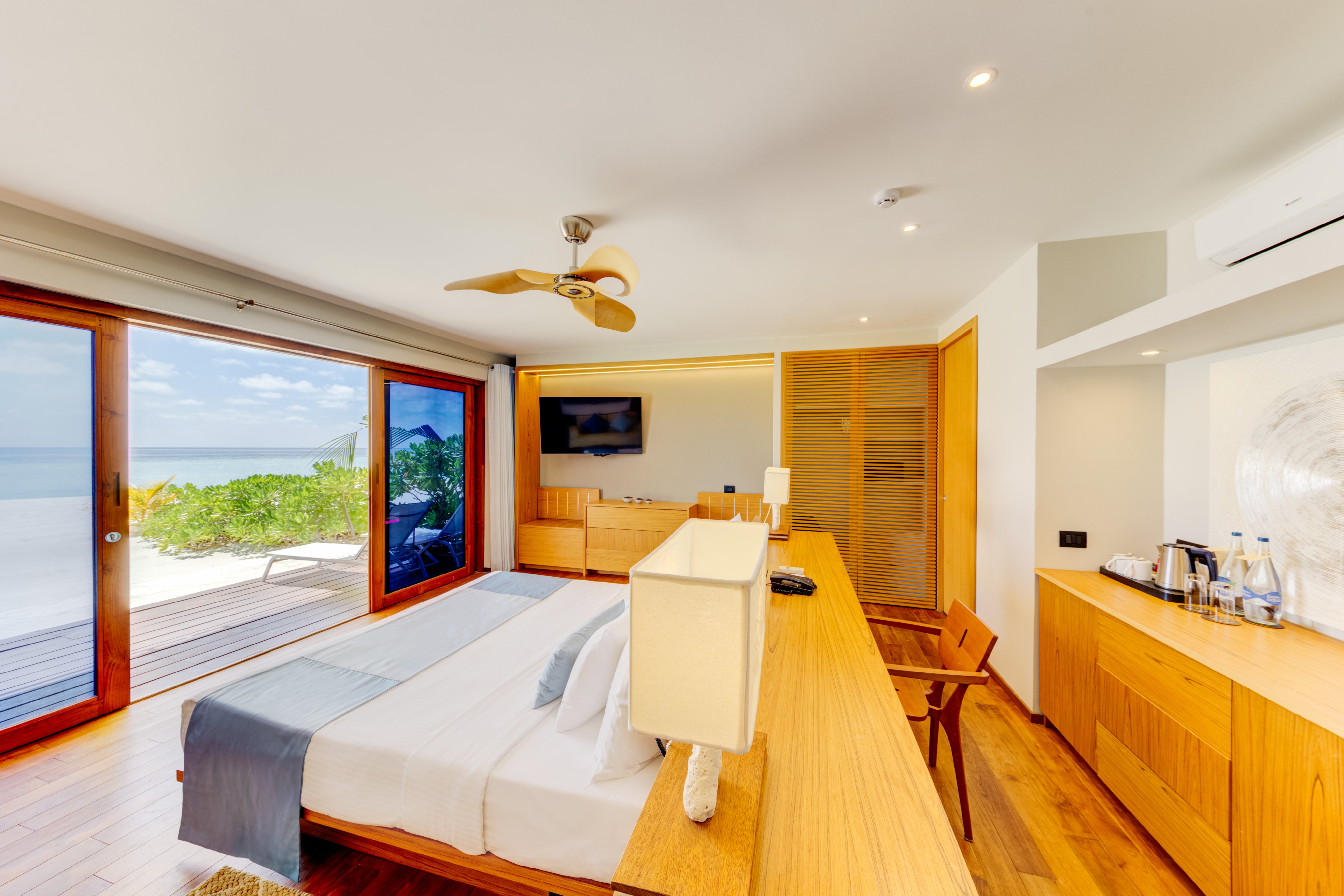 CINNAMON VELIFUSHI MALDIVES-guestroom-Beach Bungalow_Bedroom.jpg