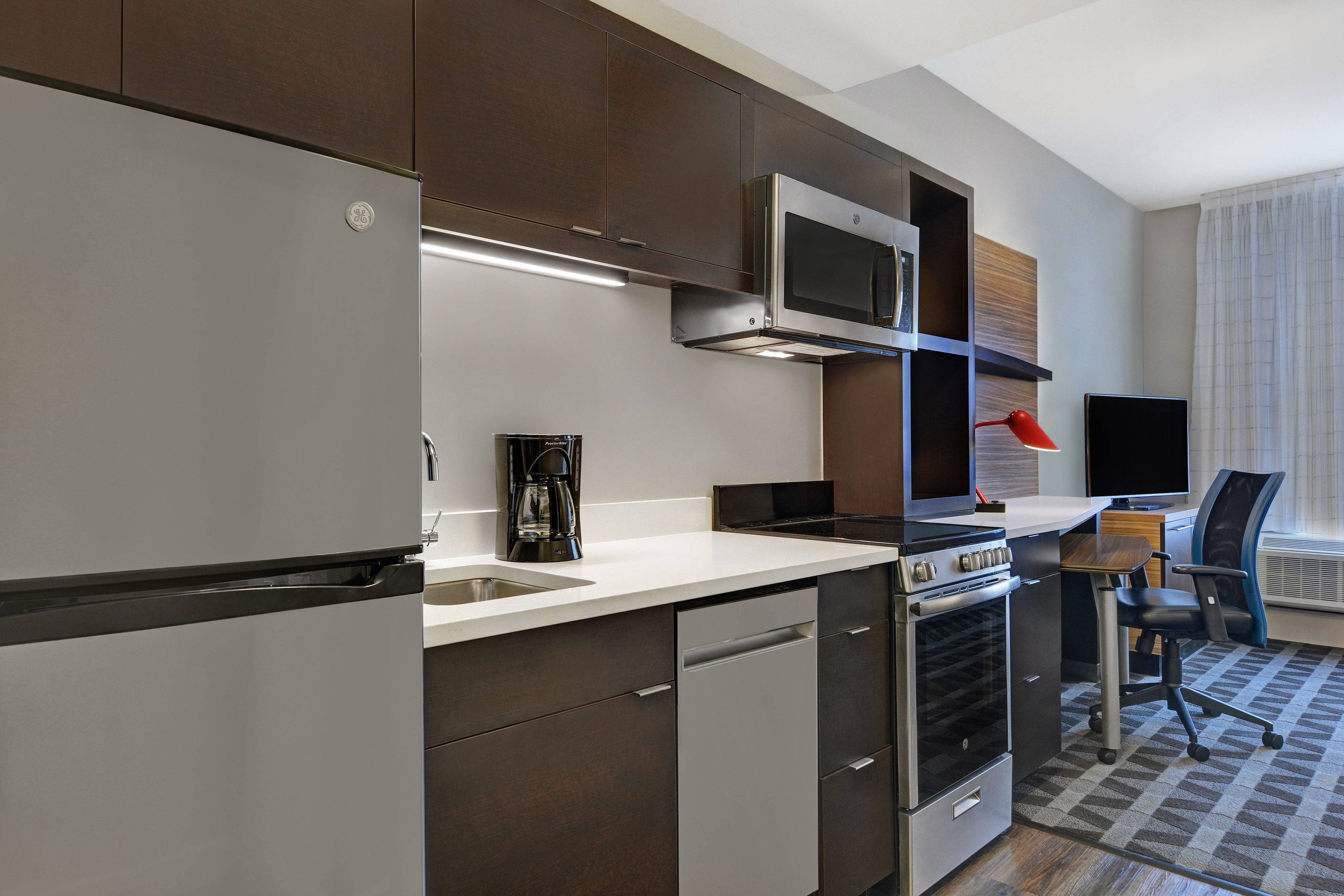 TownePlace Suites by Marriott Sarasota Bradenton West-guestroom-One-Bedroom Suite Kitchen.jpg
