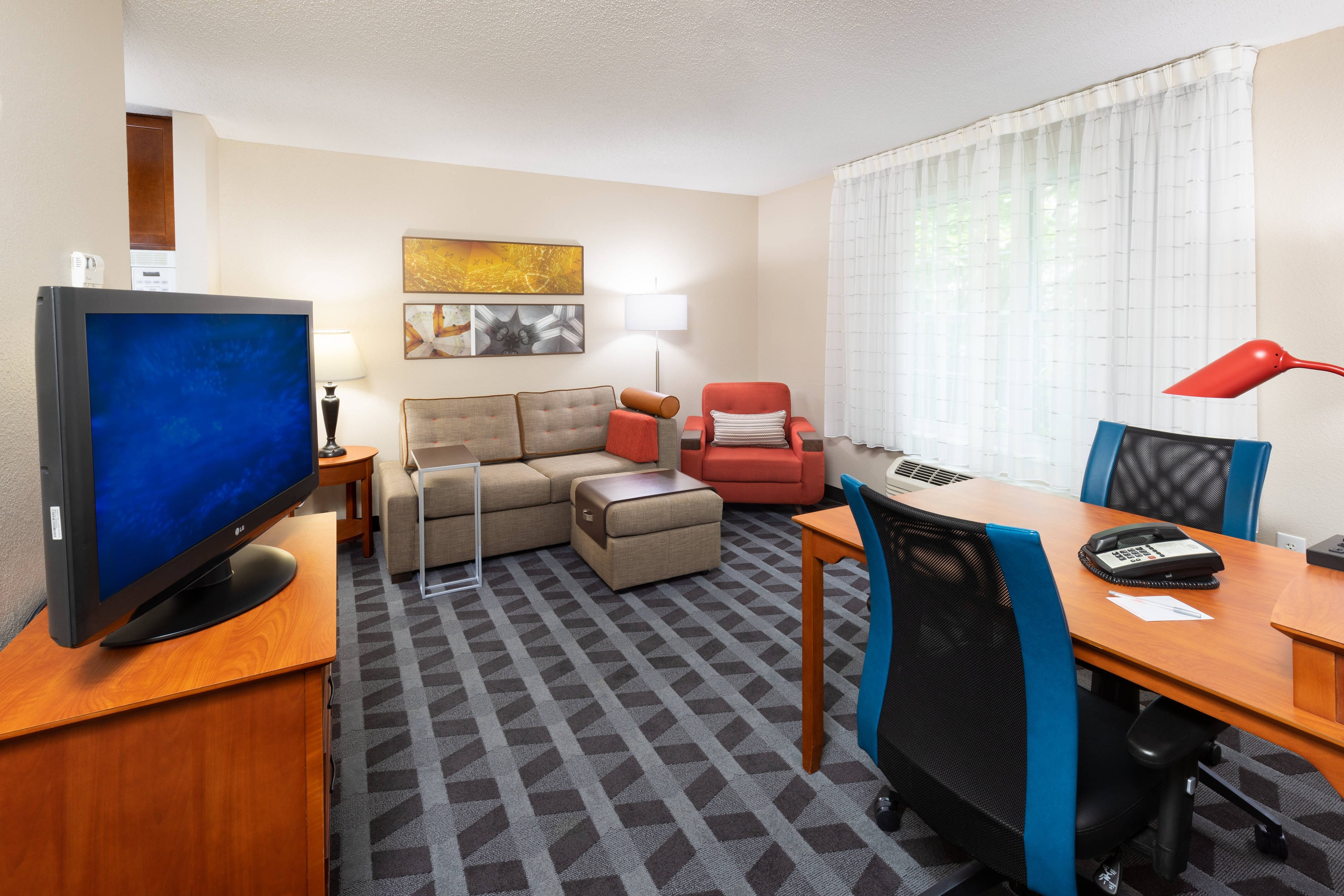TownePlace Suites by Marriott Bowie Town Center-guestroom-One-Bedroom Suite - Living Room.jpg