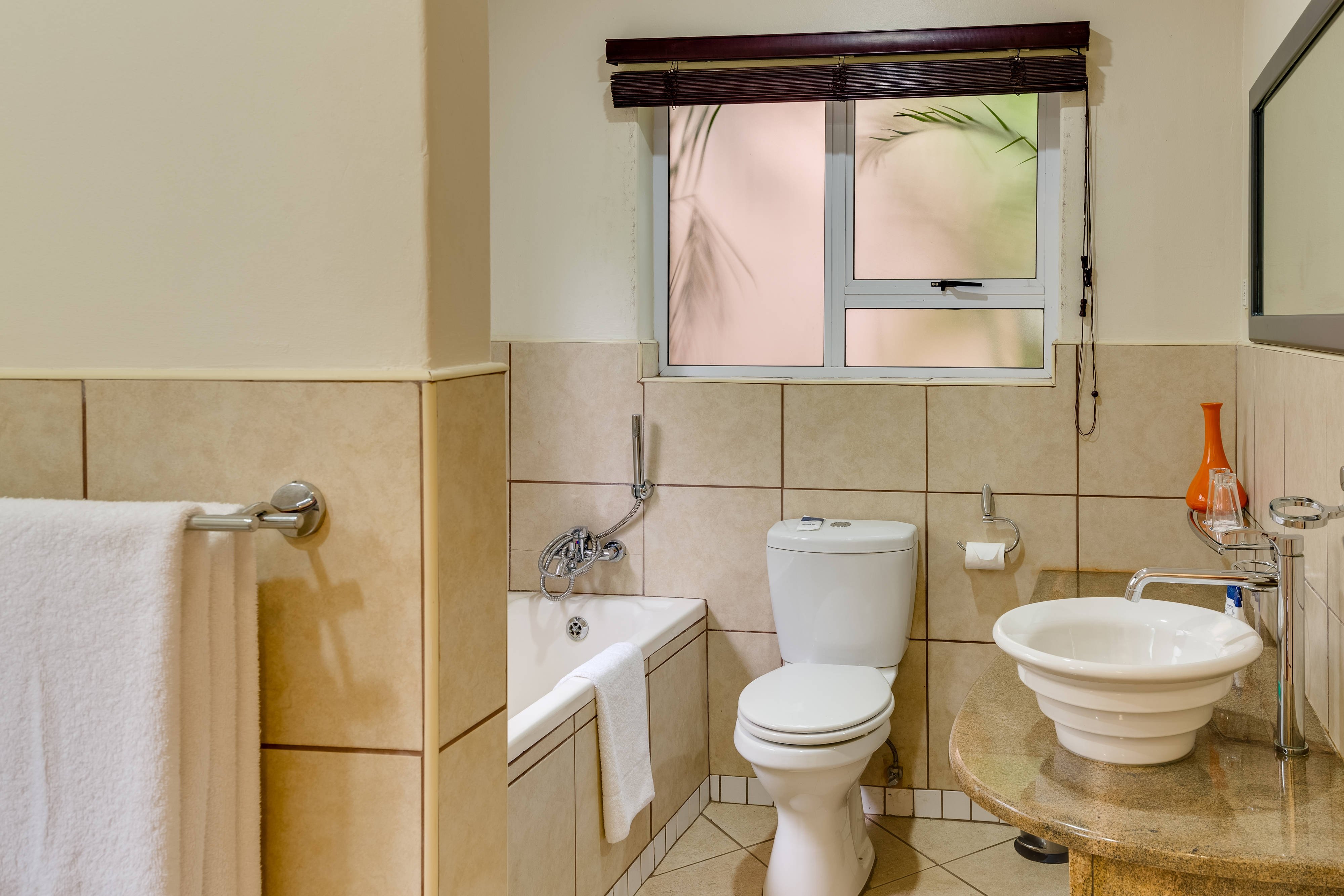 Protea Hotel by Marriott Umfolozi River-guestroom-Chalet Guest Bathroom.jpg