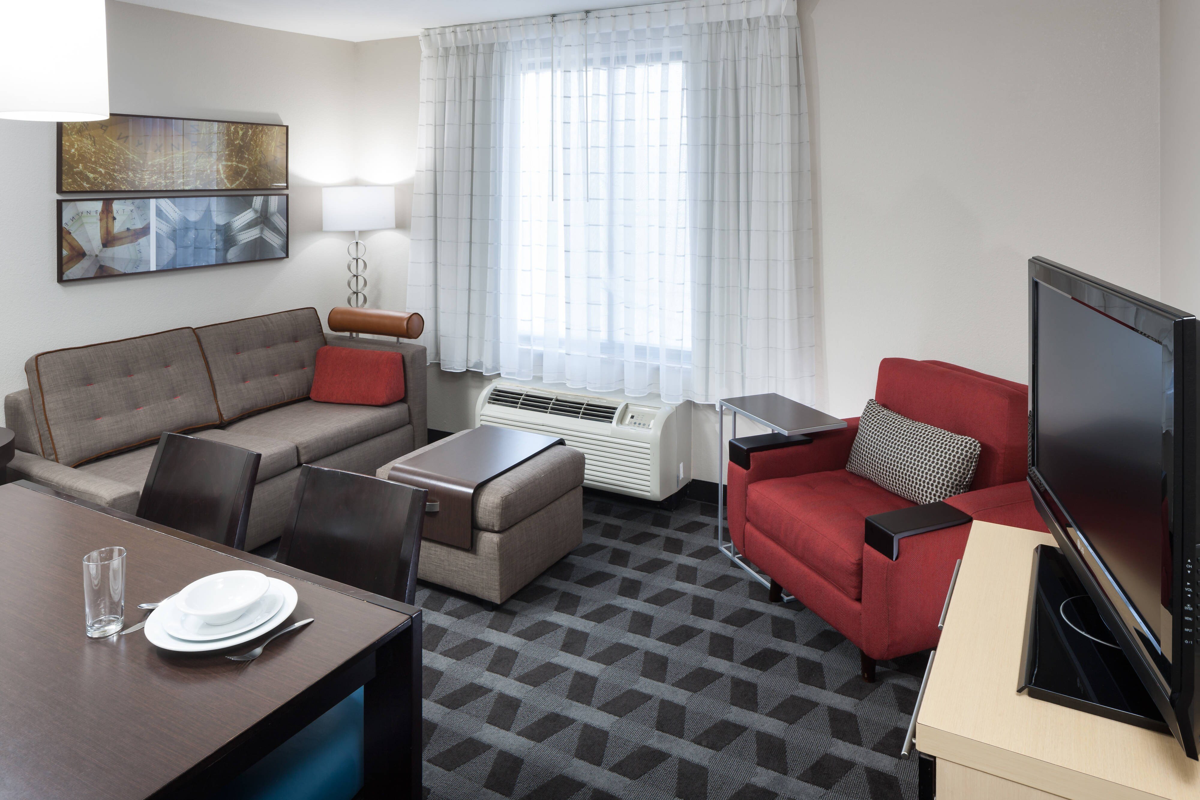 TownePlace Suites by Marriott Columbia Southeast-Fort Jackson-guestroom-One-Bedroom Suite - Living Area.jpg