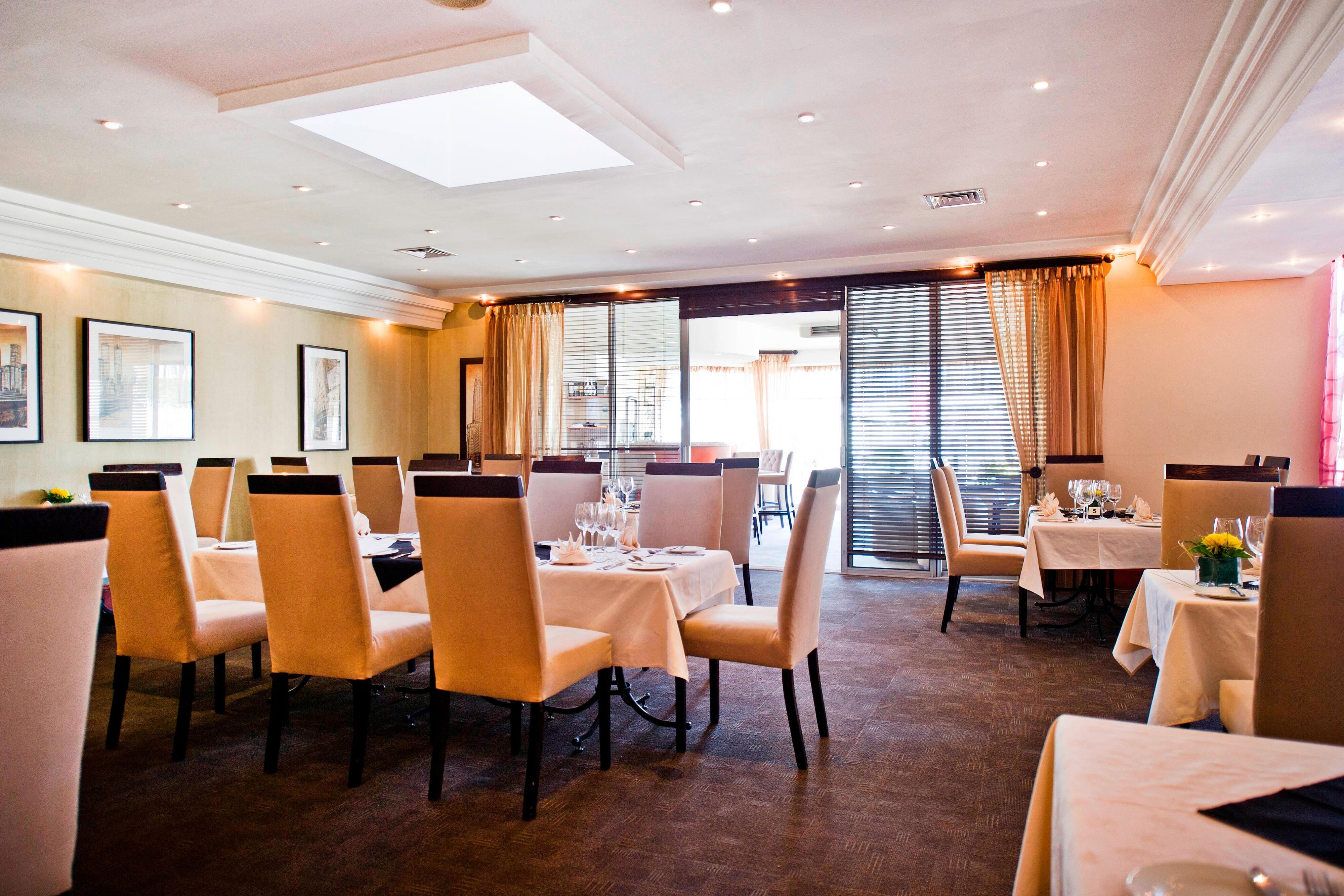 Protea Hotel by Marriott Windhoek Fuerstenhof-guestroom-Dining Area.jpg