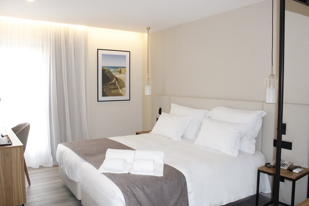 SINERAMA HOTEL APARTAMENTO-guestroom-108175 Guest Room.jpg