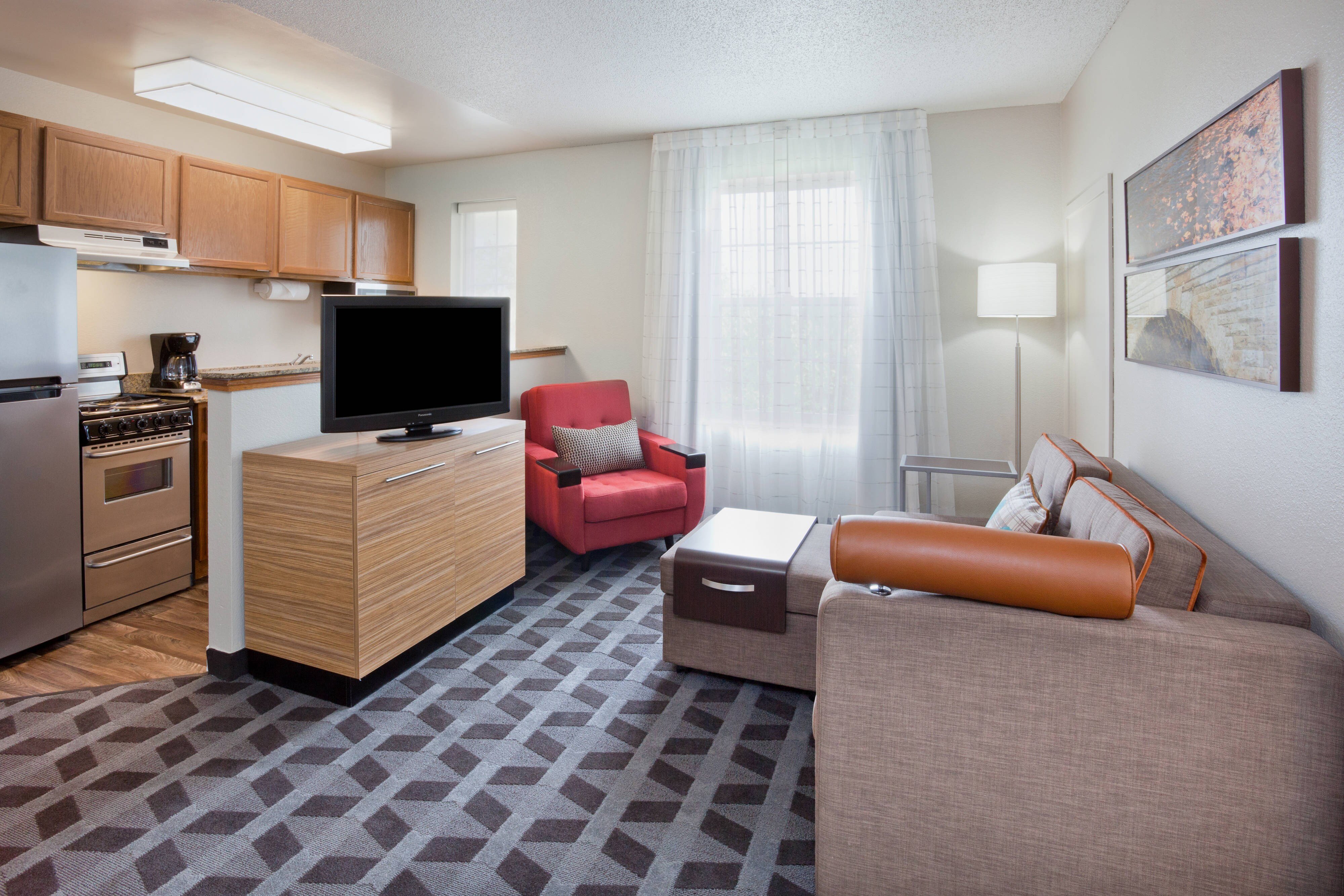 TownePlace Suites by Marriott Minneapolis Eden Prairie-guestroom-Two-Bedroom Suite Kitchen & Living Room.jpg