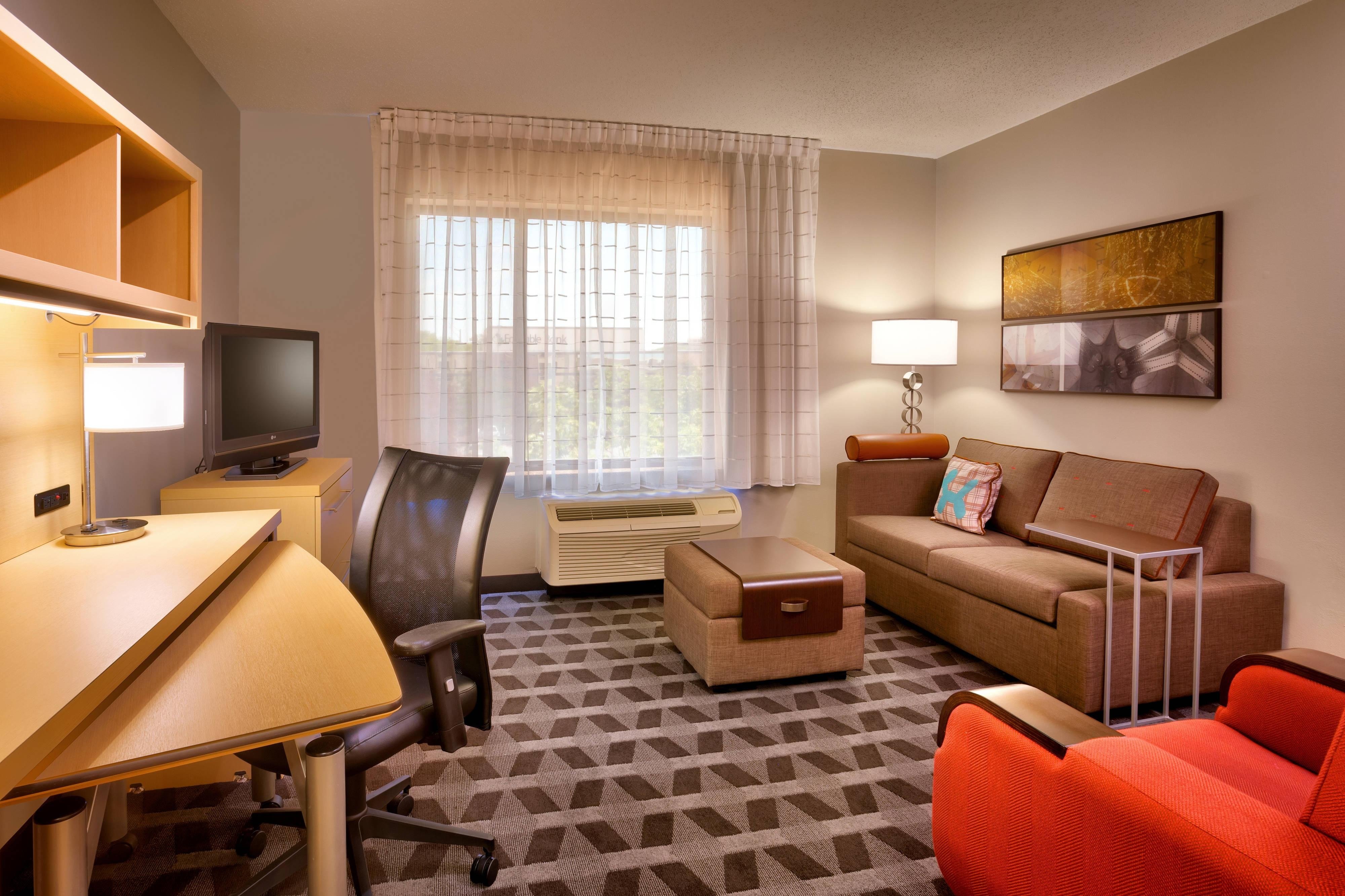 TownePlace Suites by Marriott Omaha West-guestroom-One-Bedroom Suite Living Area.jpg