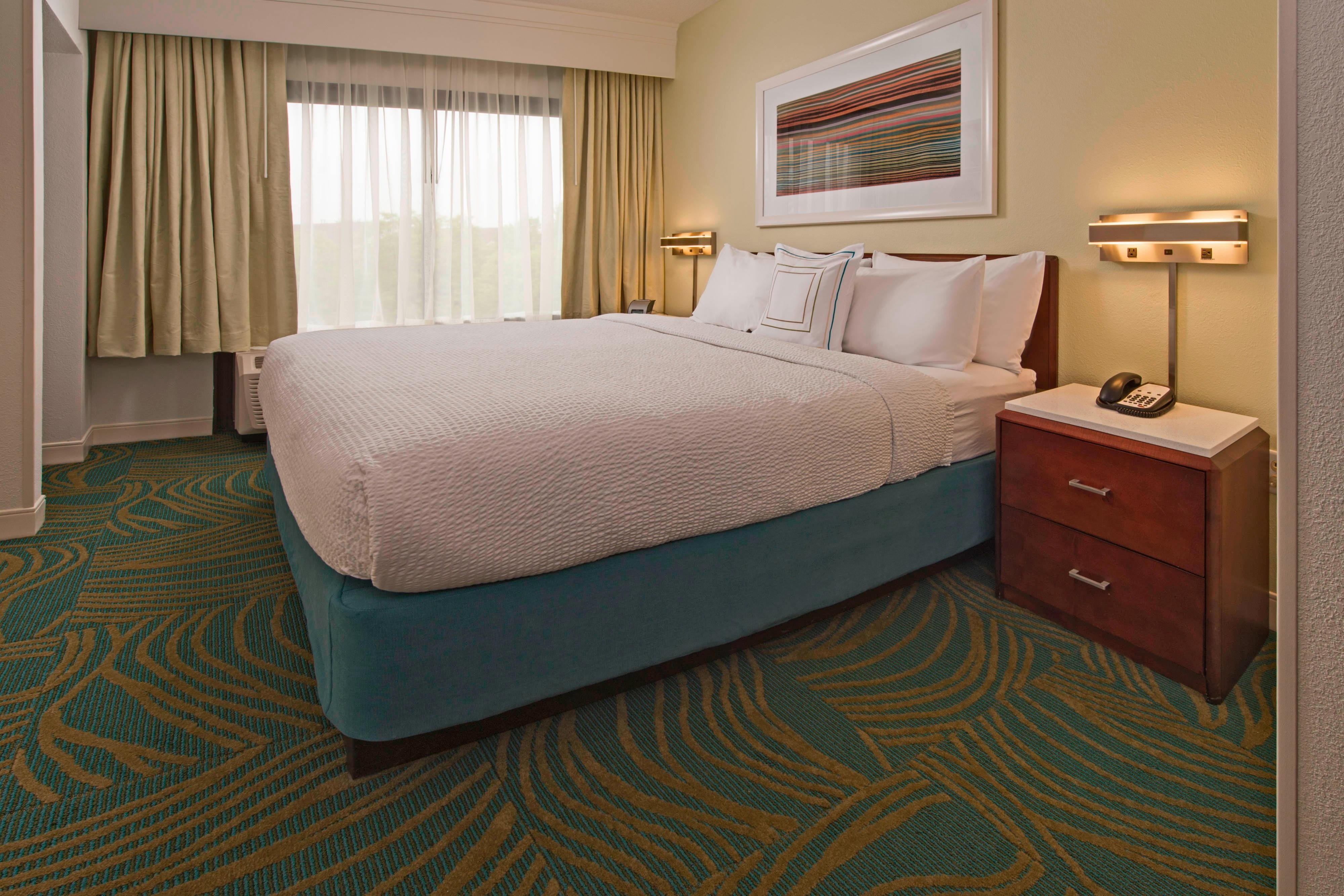 SpringHill Suites by Marriott Gaithersburg-guestroom-King Suite Sleeping Area.jpg