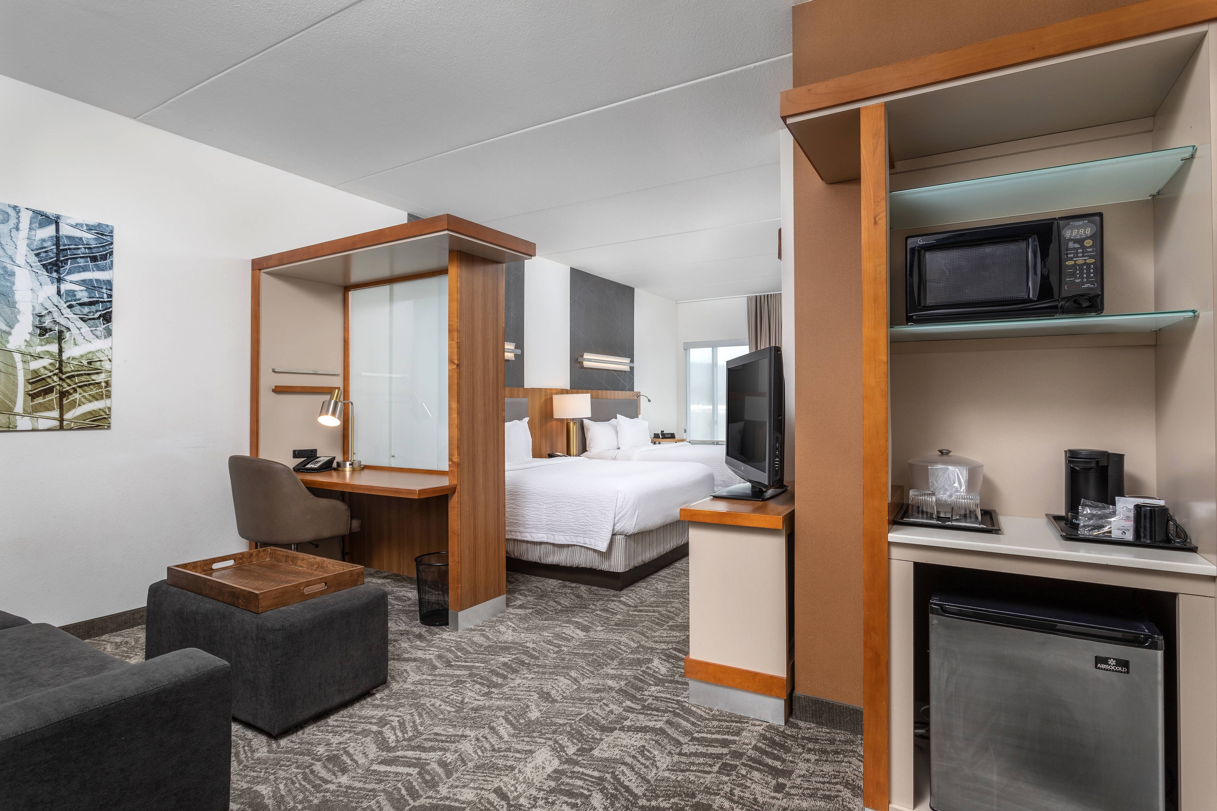 SpringHill Suites by Marriott Chattanooga Downtown/Cameron Harbor-guestroom-Queen/Queen Suite - Living Area.jpg