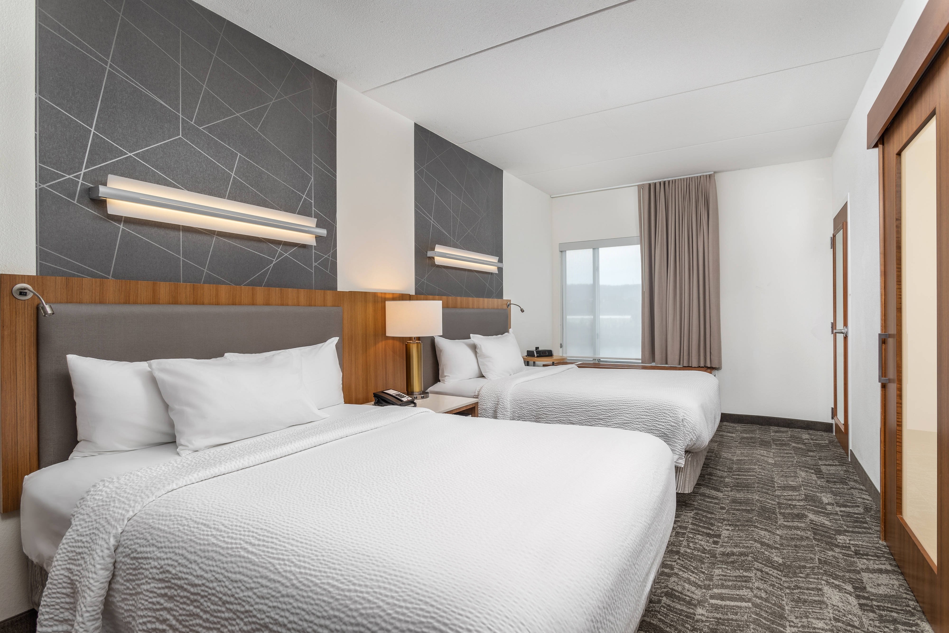 SpringHill Suites by Marriott Chattanooga Downtown/Cameron Harbor-guestroom-Queen/Queen Suite Sleeping Area.jpg