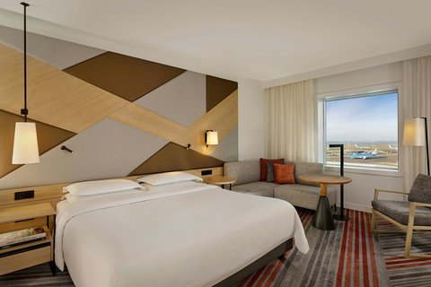 Renovated Sheraton King Guestroom with Airport Vie