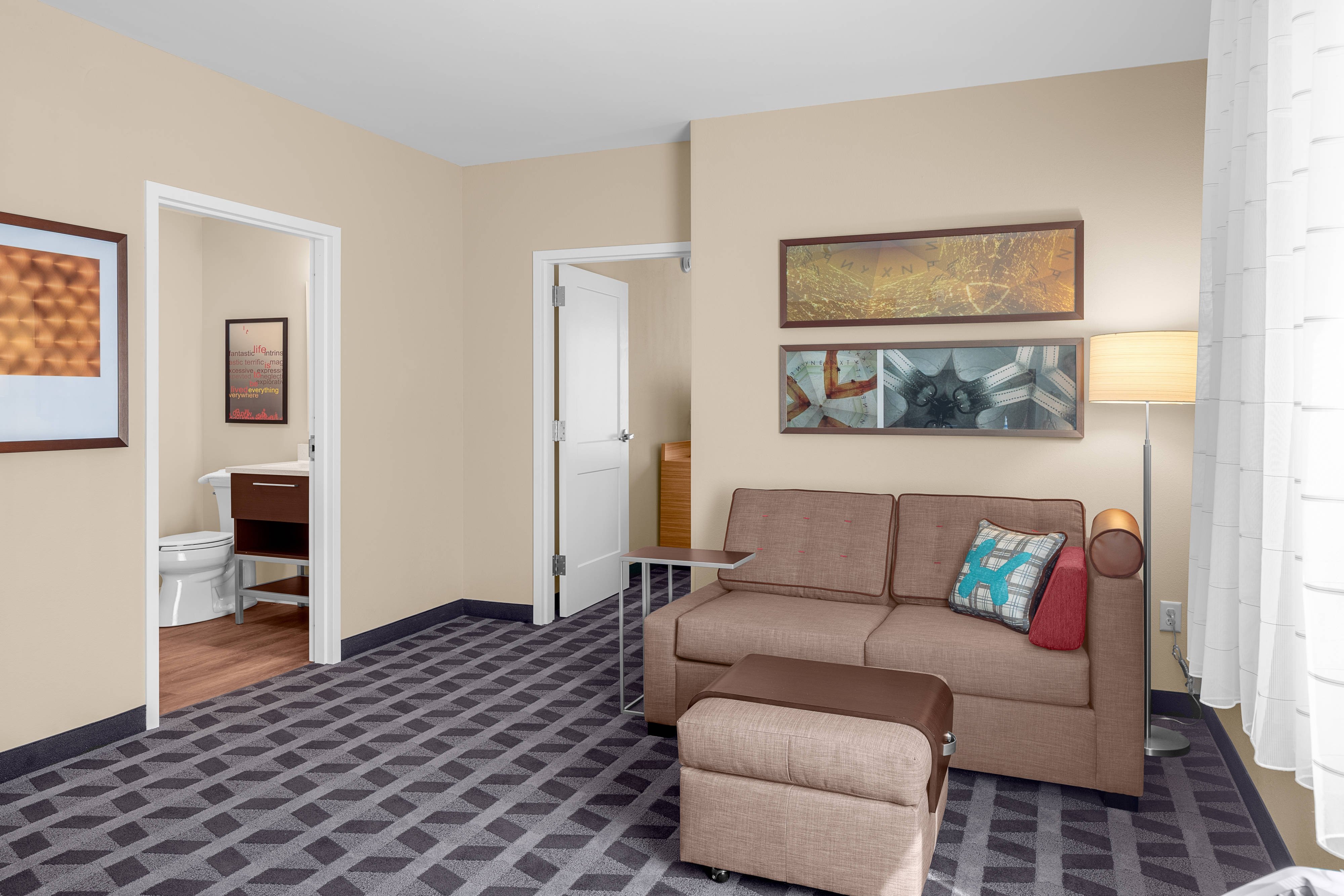 TownePlace Suites by Marriott Cincinnati Fairfield-guestroom-One-Bedroom Queen Suite - Living Area.jpg