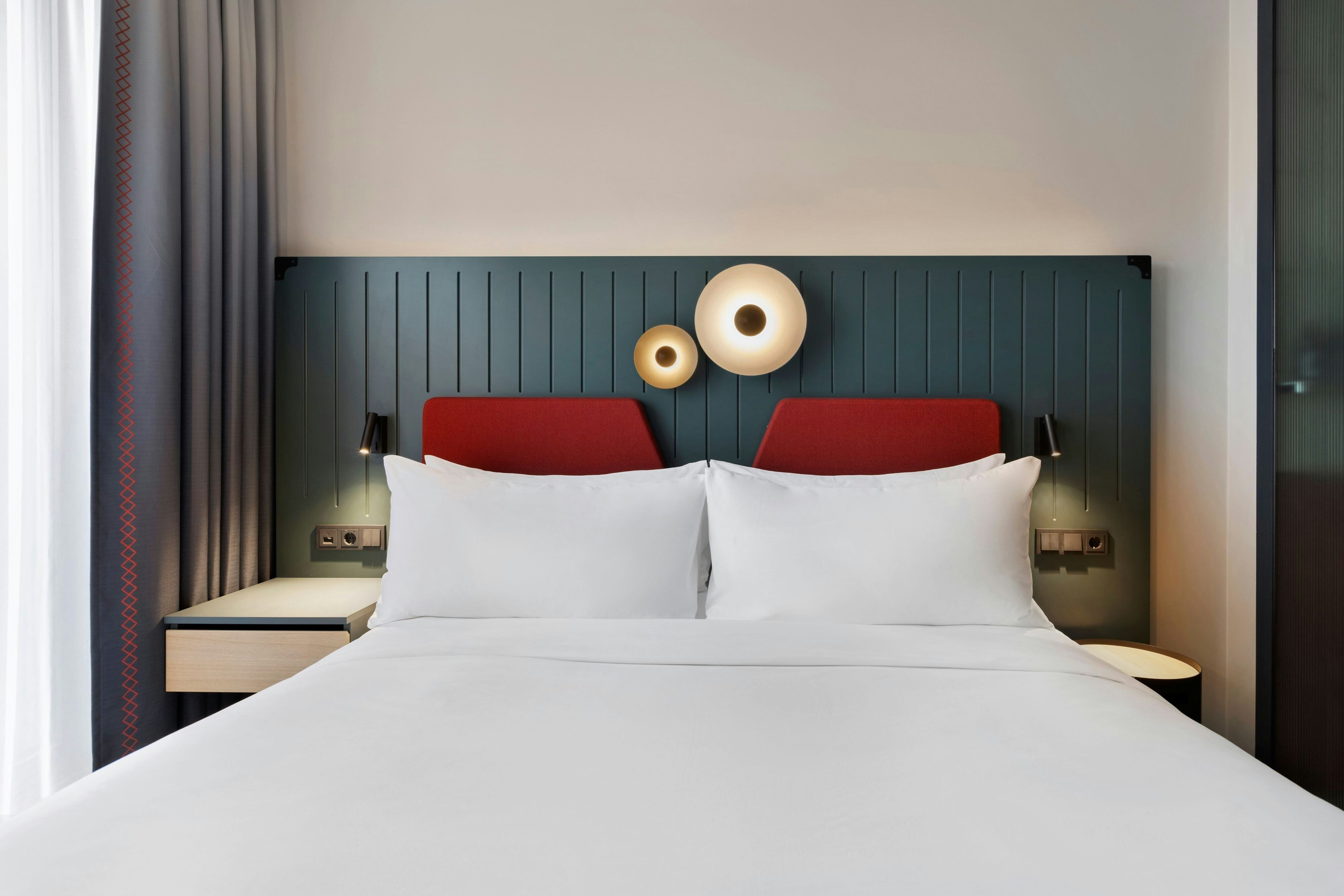 The Passenger a Tribute Portfolio Hotel-guestroom-Guest room bed and headboard.jpg
