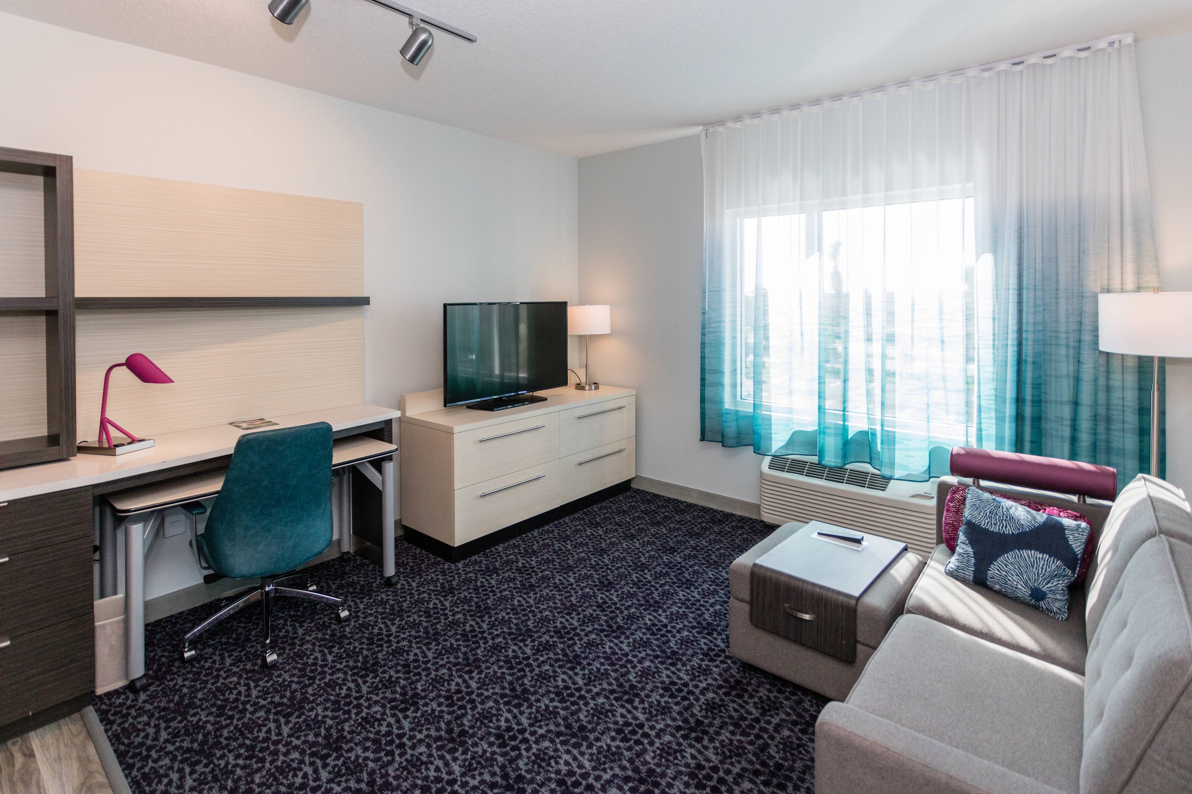 TownePlace Suites by Marriott Port St Lucie I-95-guestroom-One-Bedroom Suite - Living Room.jpg