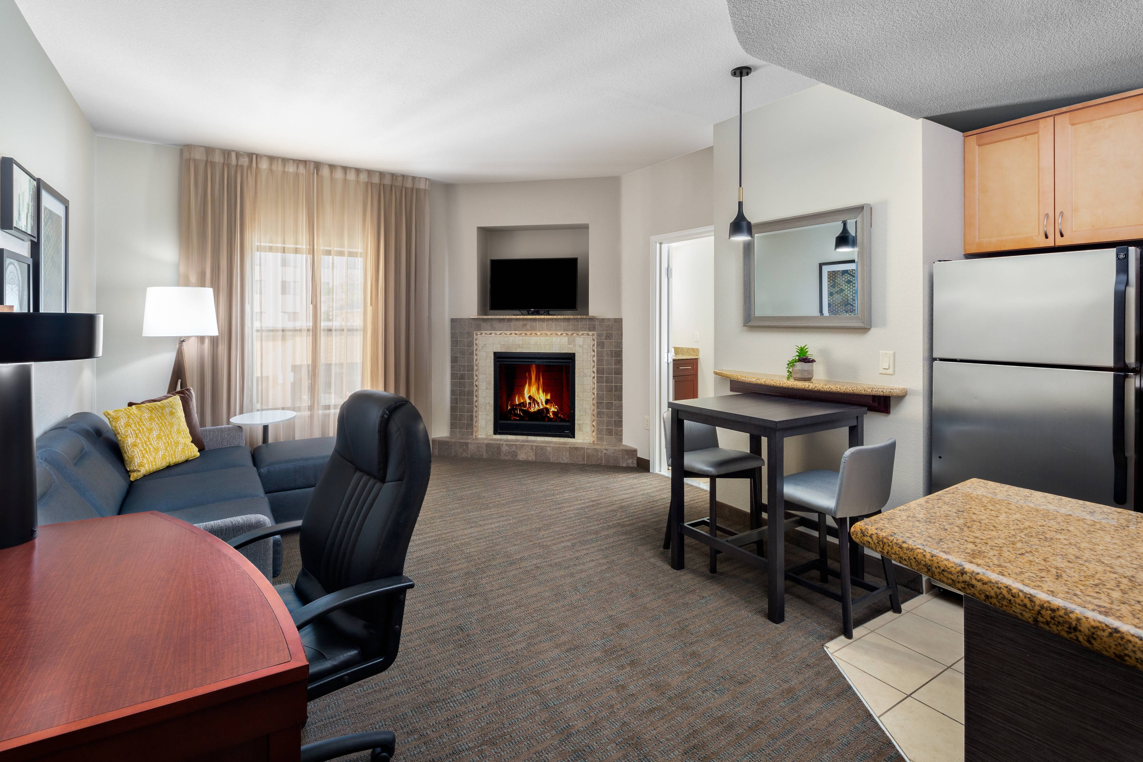 Residence Inn by Marriott Phoenix NW-Surprise-guestroom-One-Bedroom Fireplace Suite - Living Area.jpg