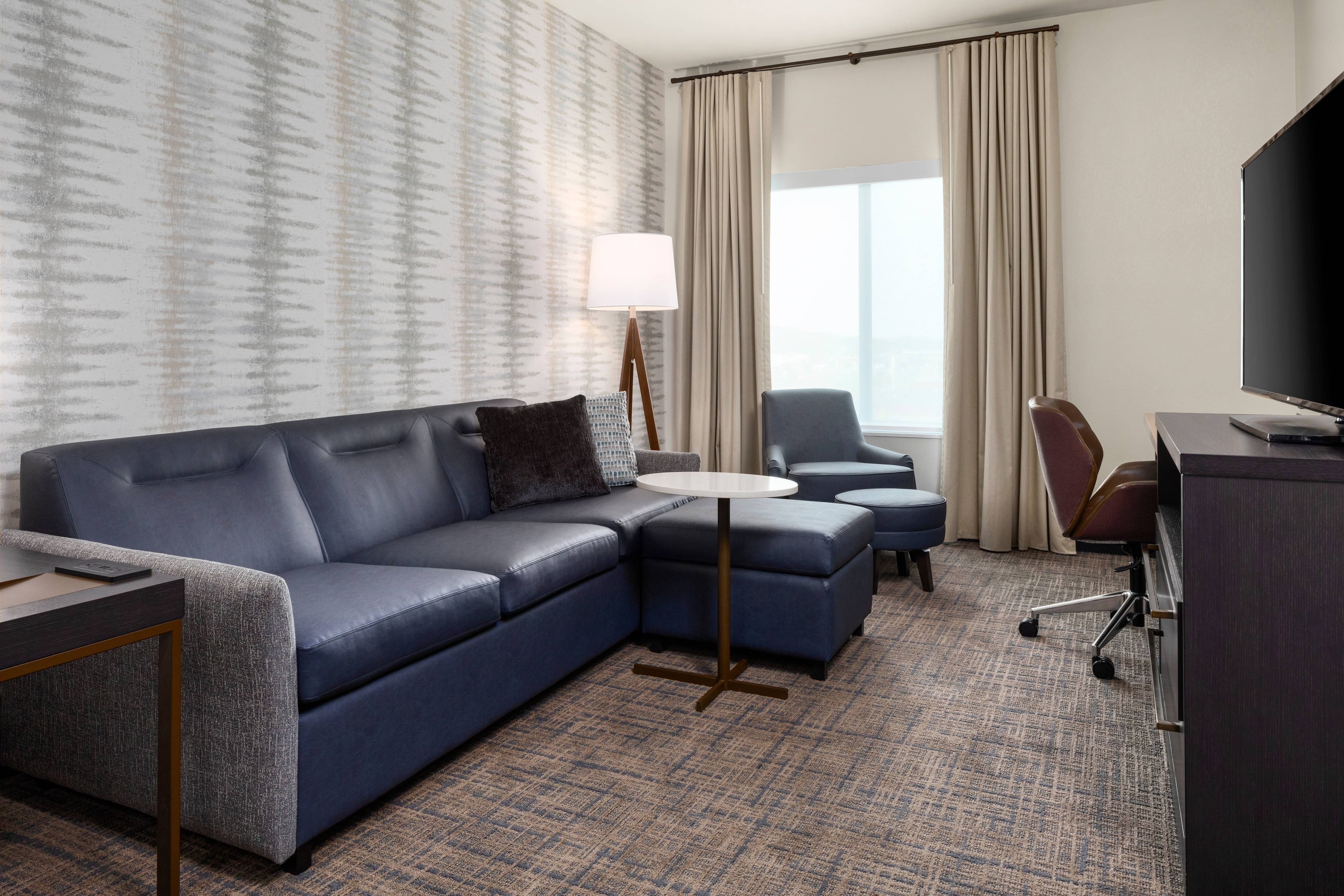 Residence Inn by Marriott Peoria East-guestroom-One-Bedroom Suite - Living Area.jpg