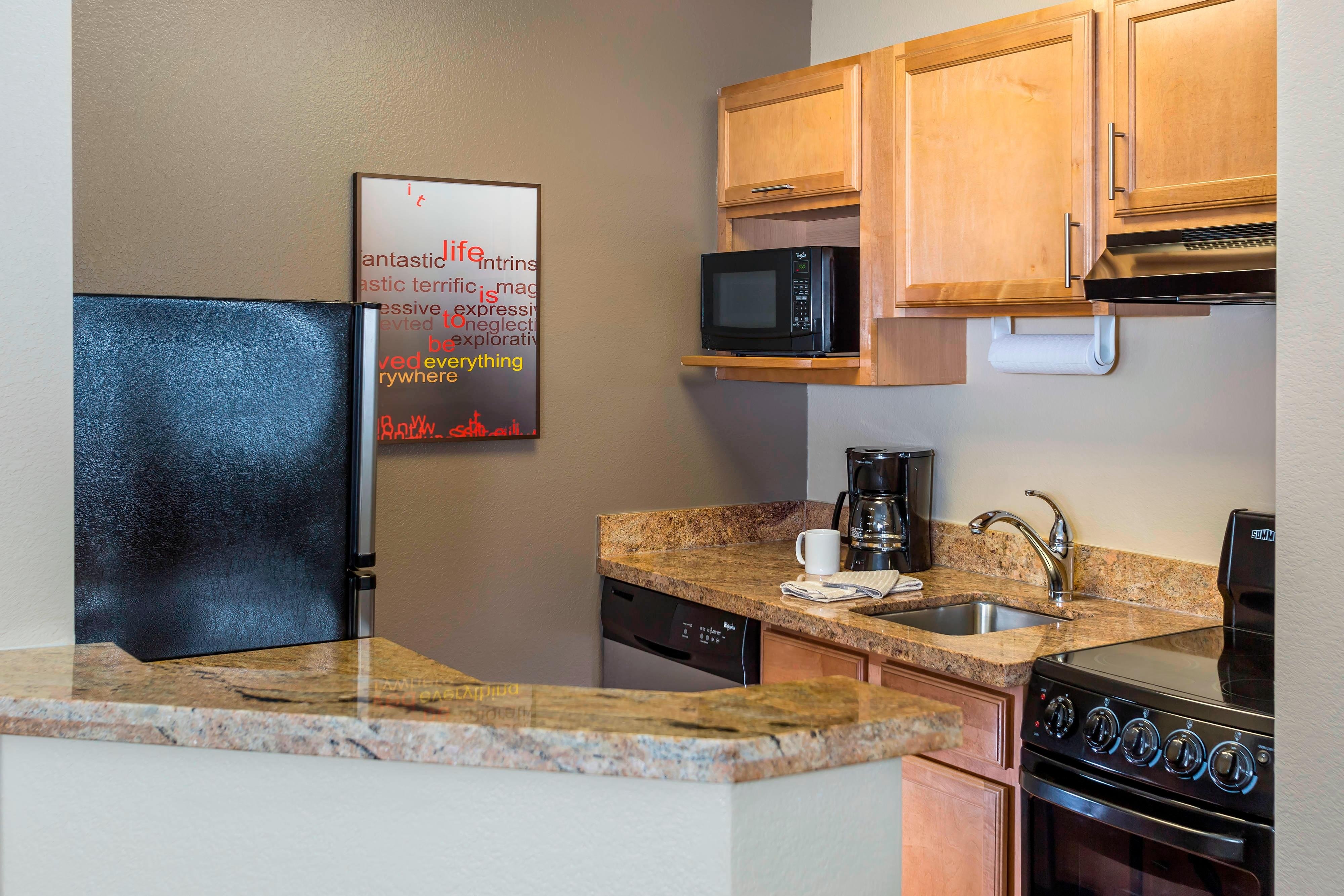 TownePlace Suites by Marriott Phoenix North-guestroom-Suite Kitchen.jpg